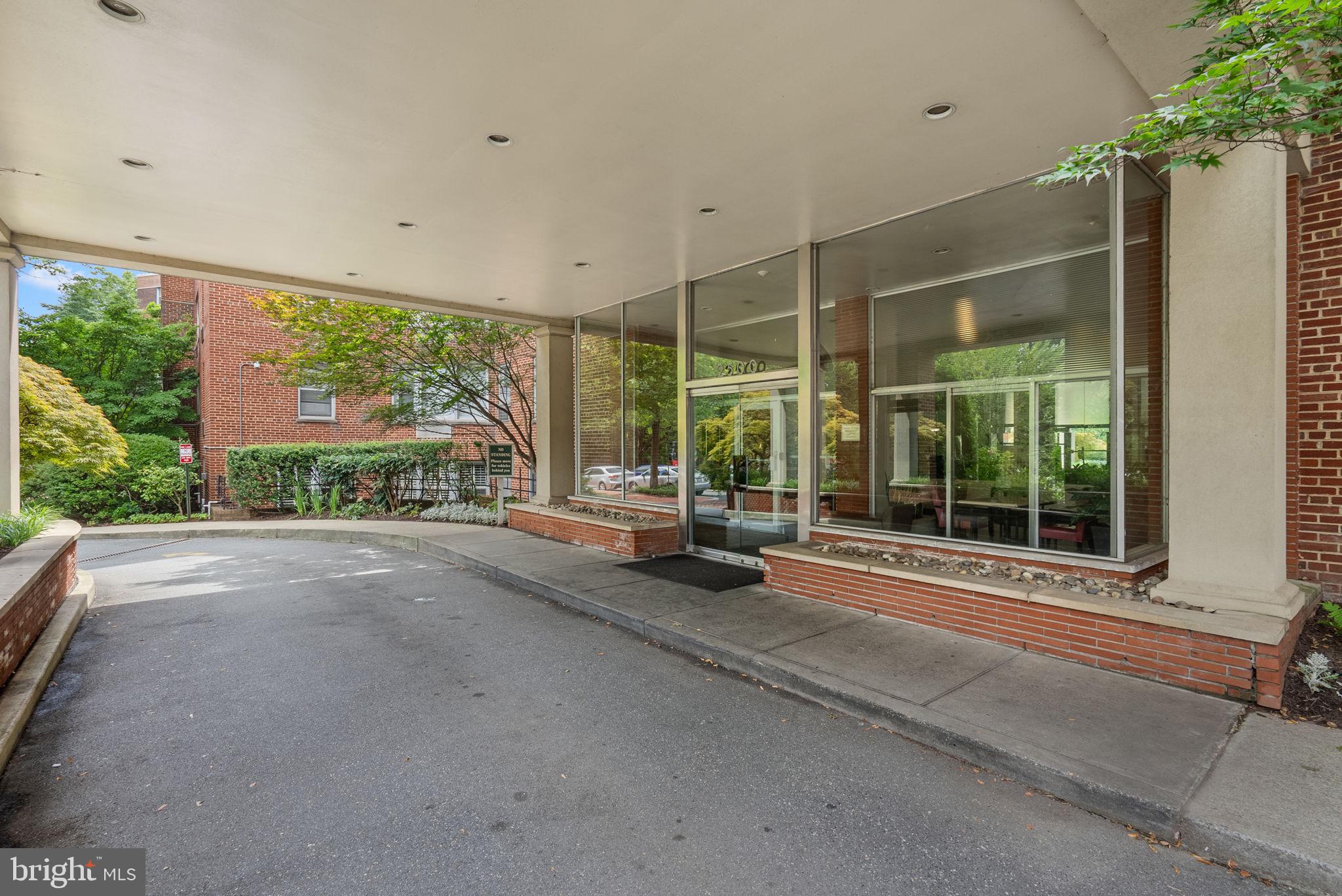 2500 Q Street Northwest, Unit 524 Washington, DC 20007 - Photo 4 of 50 a view of a room with a large window and wooden fence