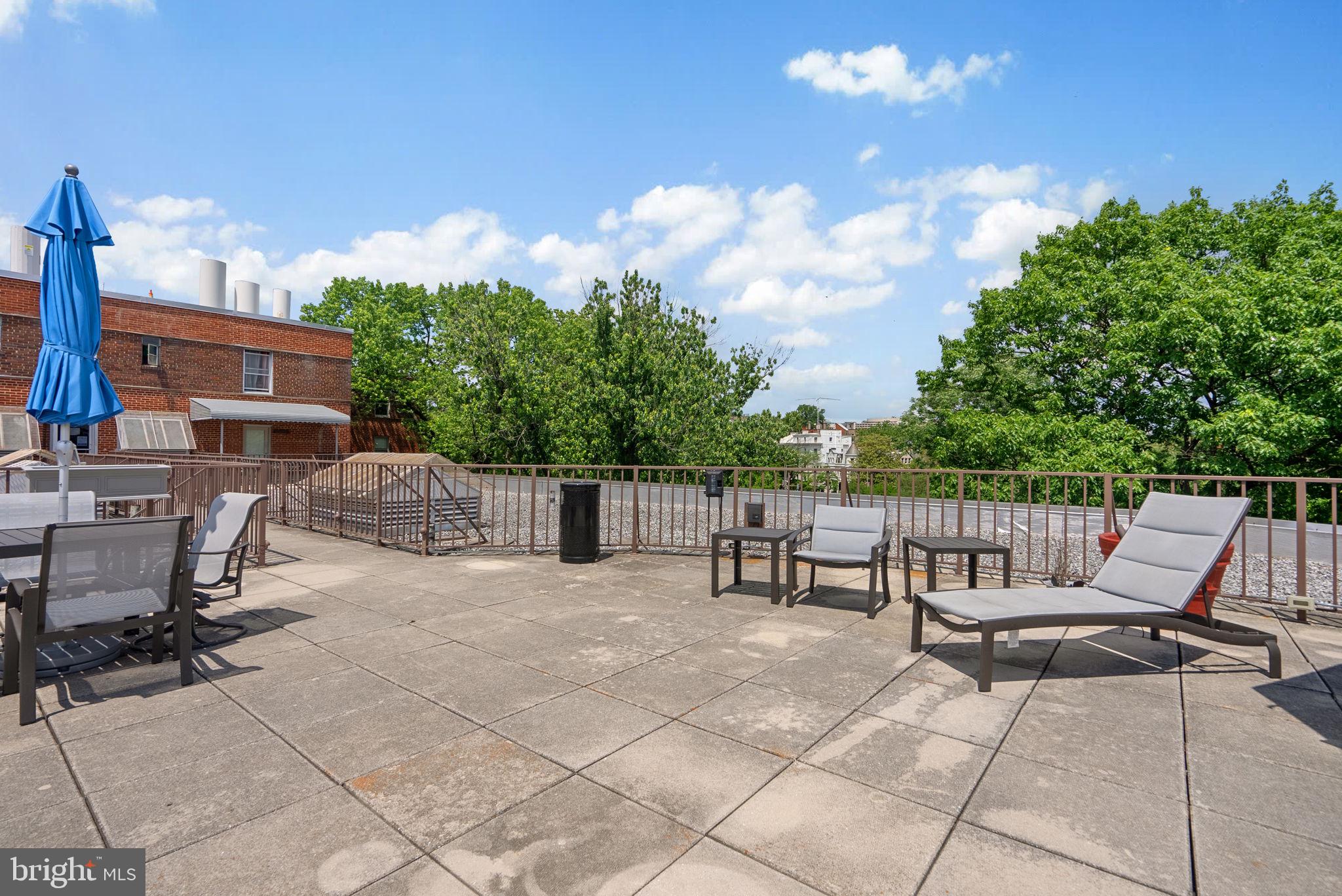 2500 Q Street Northwest, Unit 524 Washington, DC 20007 - Photo 41 of 50 a view of a terrace with furniture