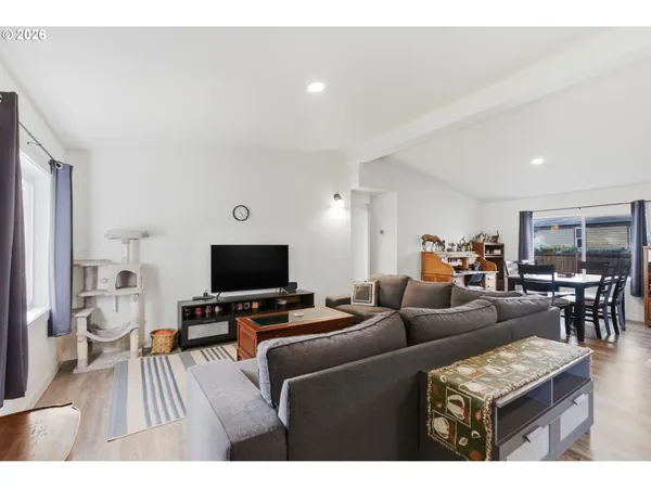 a living room with furniture and a couch