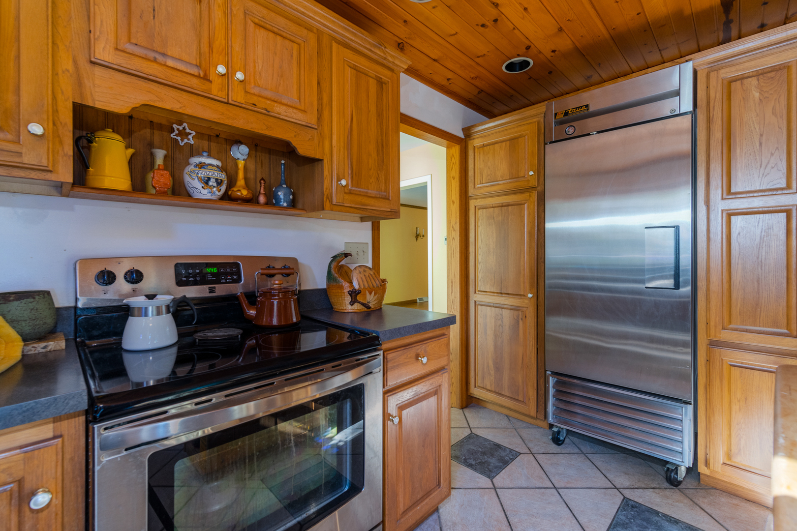 3473 East 449th Road LaSalle, IL 61301 - Photo 22 of 61 a kitchen with stainless steel appliances granite countertop a stove and a refrigerator