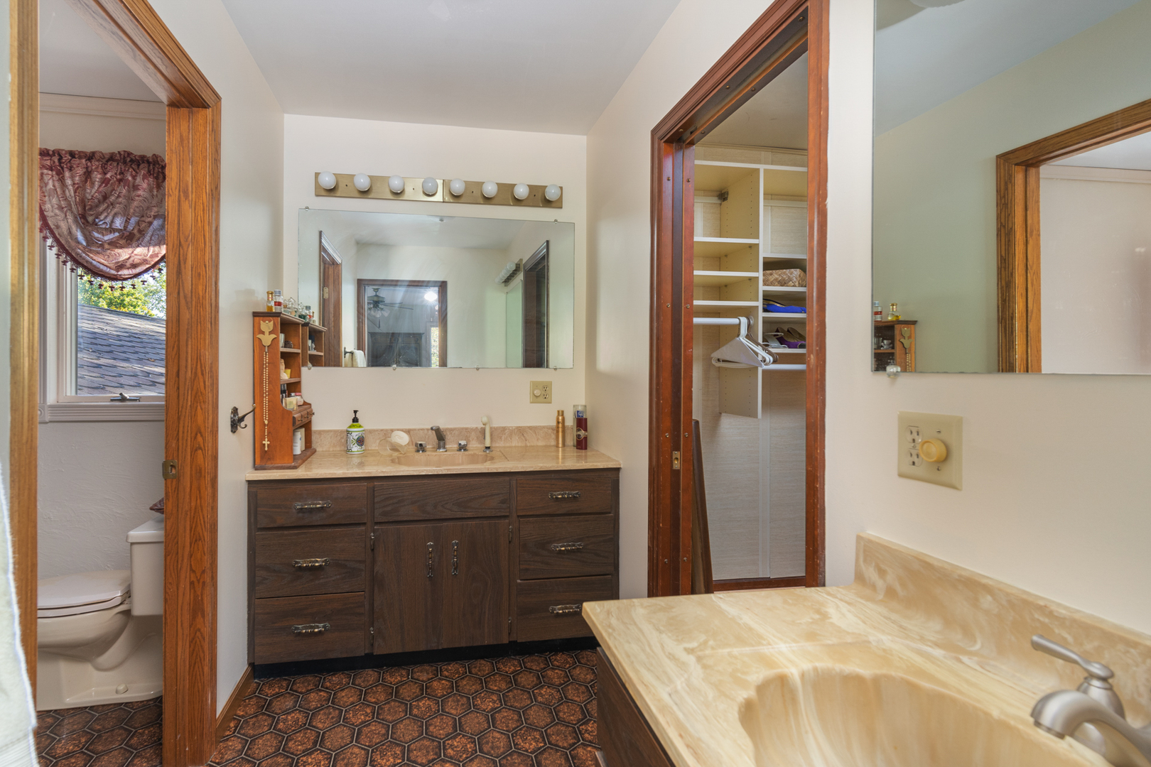 3473 East 449th Road LaSalle, IL 61301 - Photo 43 of 61 a spacious bathroom with a granite countertop sink and a mirror