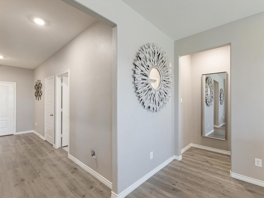 3257 Trails End Road Aubrey, TX 76227 - Photo 17 of 37 wooden floor with a white walls