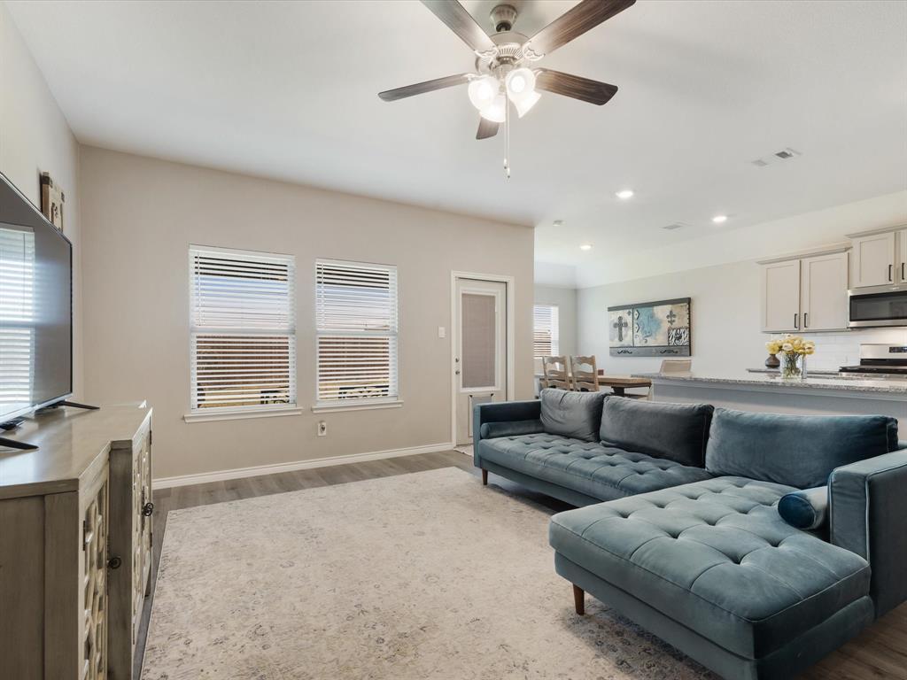 3257 Trails End Road Aubrey, TX 76227 - Photo 18 of 37 a living room with furniture and a window
