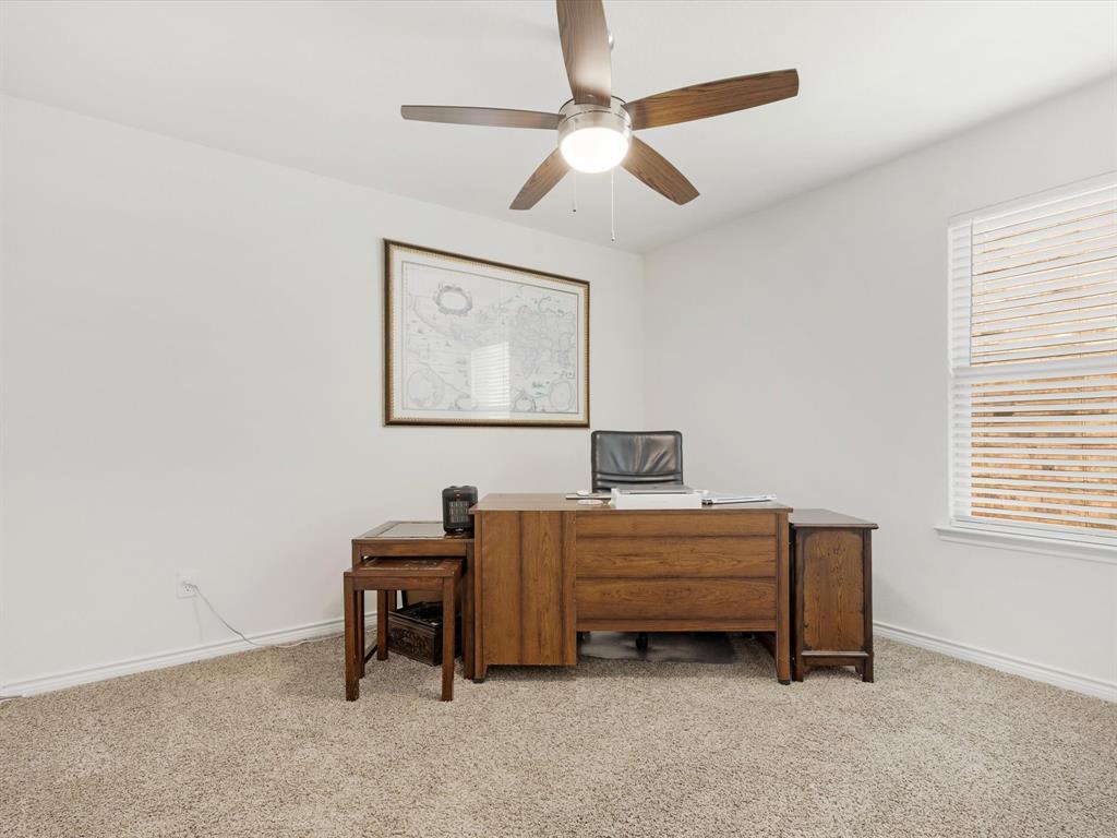 3257 Trails End Road Aubrey, TX 76227 - Photo 22 of 37 a room with a bed and a dresser