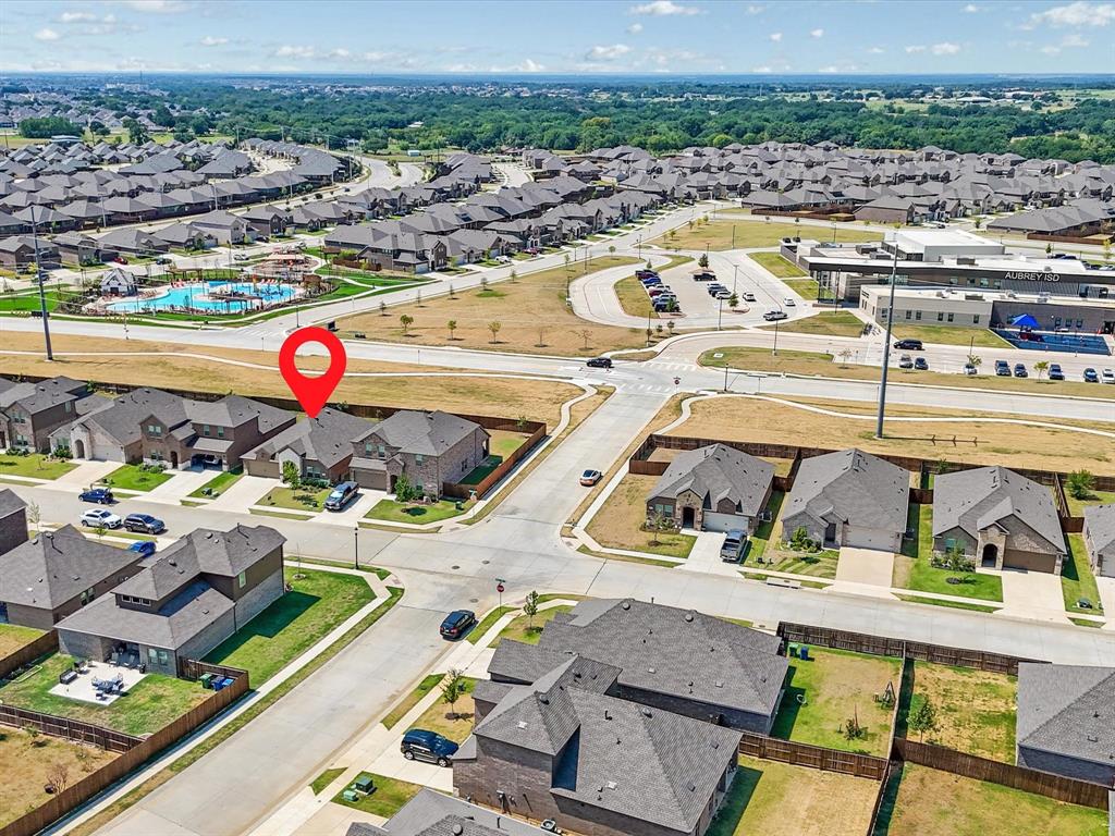 3257 Trails End Road Aubrey, TX 76227 - Photo 25 of 37 an aerial view of residential houses with outdoor space
