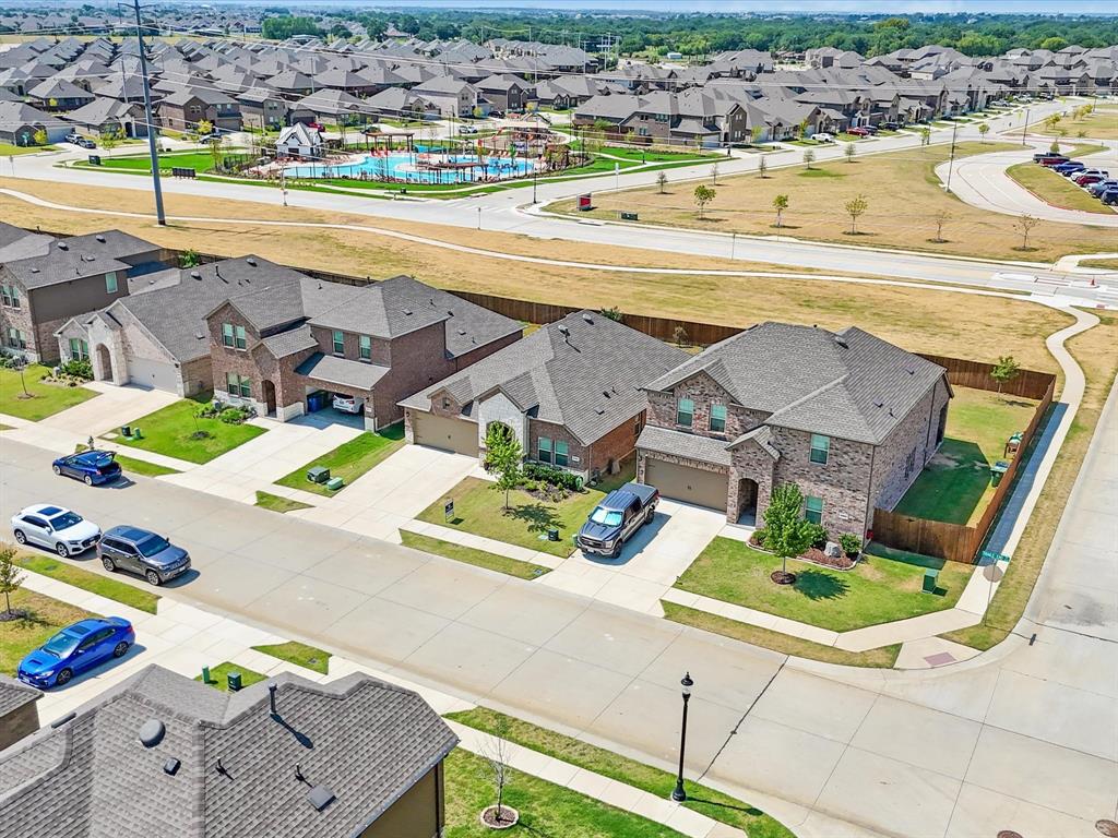 3257 Trails End Road Aubrey, TX 76227 - Photo 32 of 37 an aerial view of a house with a swimming pool yard and outdoor seating