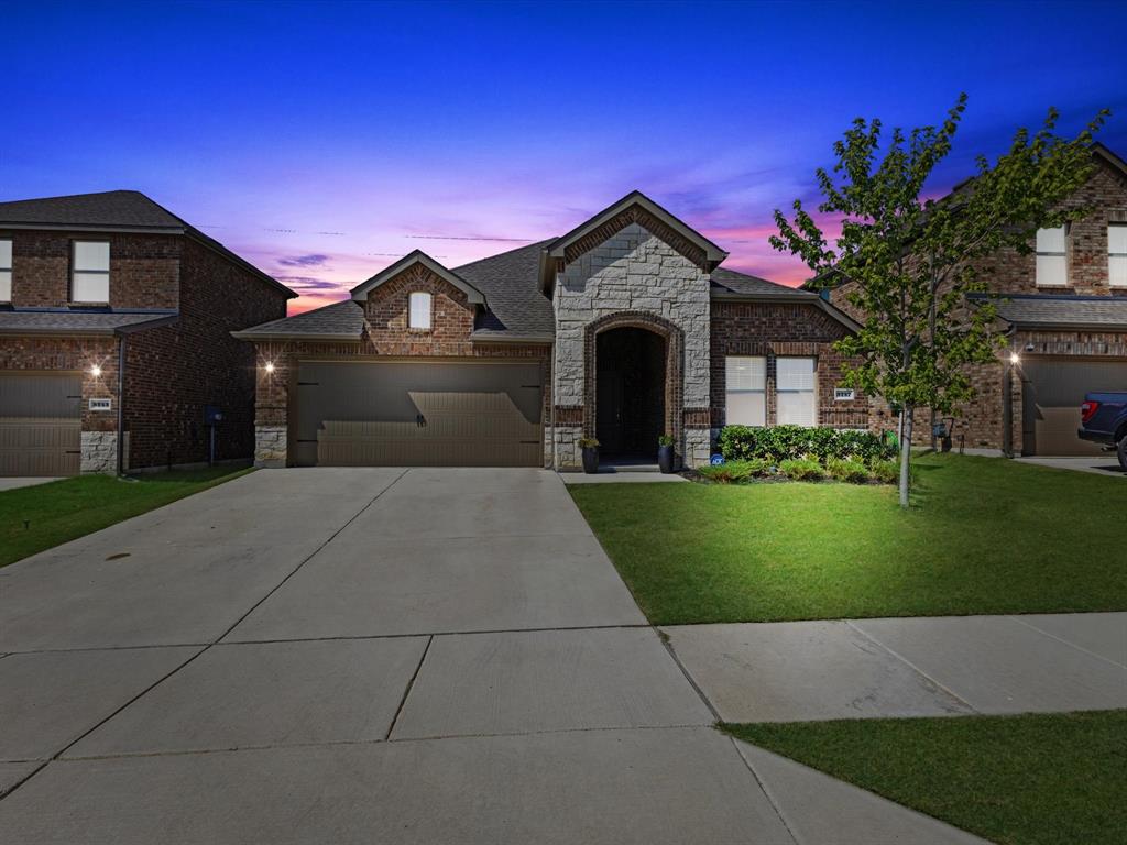 3257 Trails End Road Aubrey, TX 76227 - Photo 34 of 37 a front view of a house with a yard