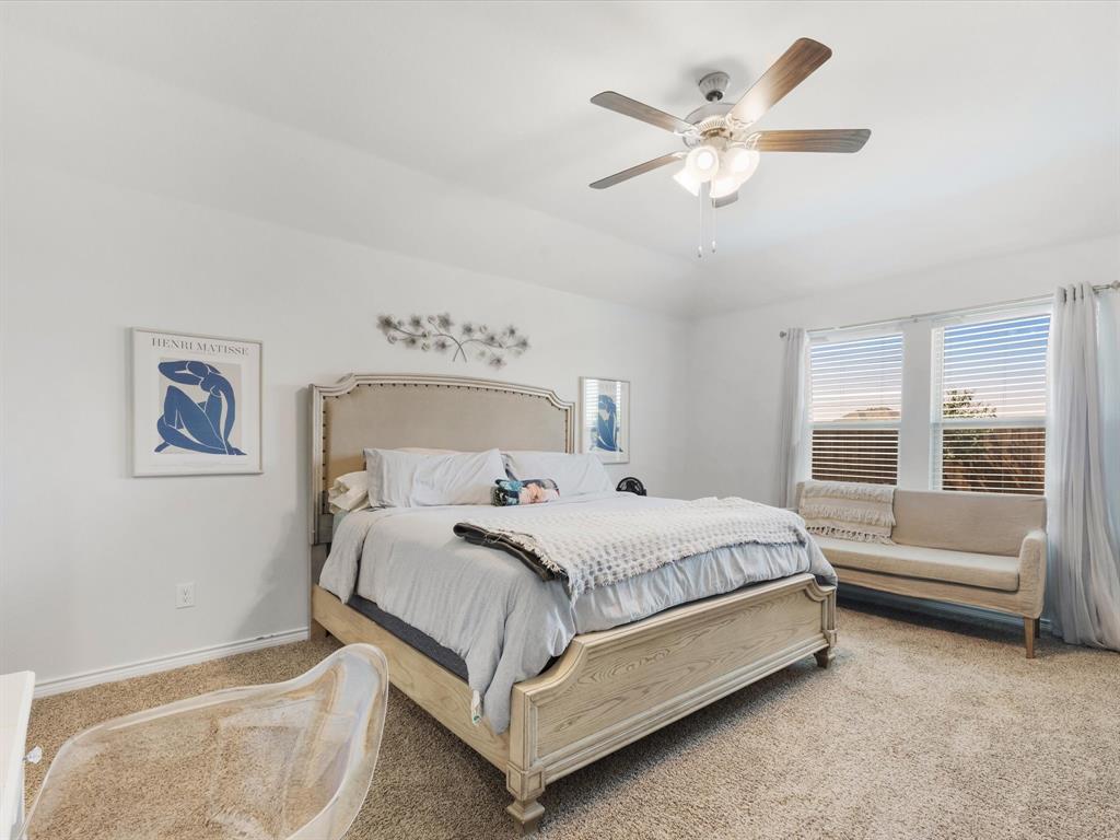 3257 Trails End Road Aubrey, TX 76227 - Photo 4 of 37 a bedroom with a bed and window
