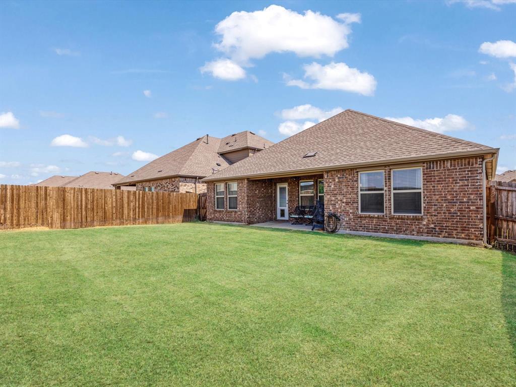 3257 Trails End Road Aubrey, TX 76227 - Photo 10 of 37 a view of a yard in front of house