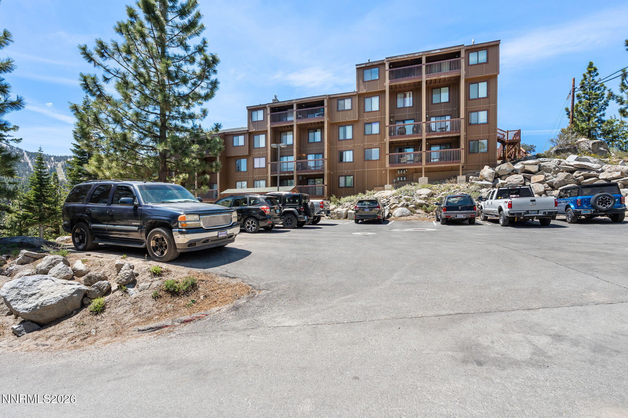 759 Boulder Court, Unit F Stateline, NV 89449 - Photo 34 of 36 a view of a cars park in front of a building