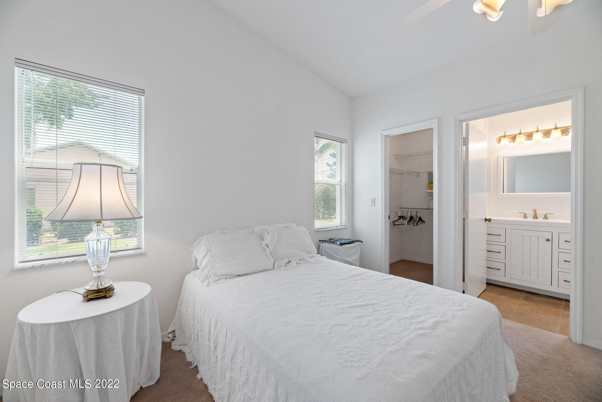 949 South Fork Circle Melbourne, FL 32901 - Photo 13 of 35 a bedroom with a bed and a sink