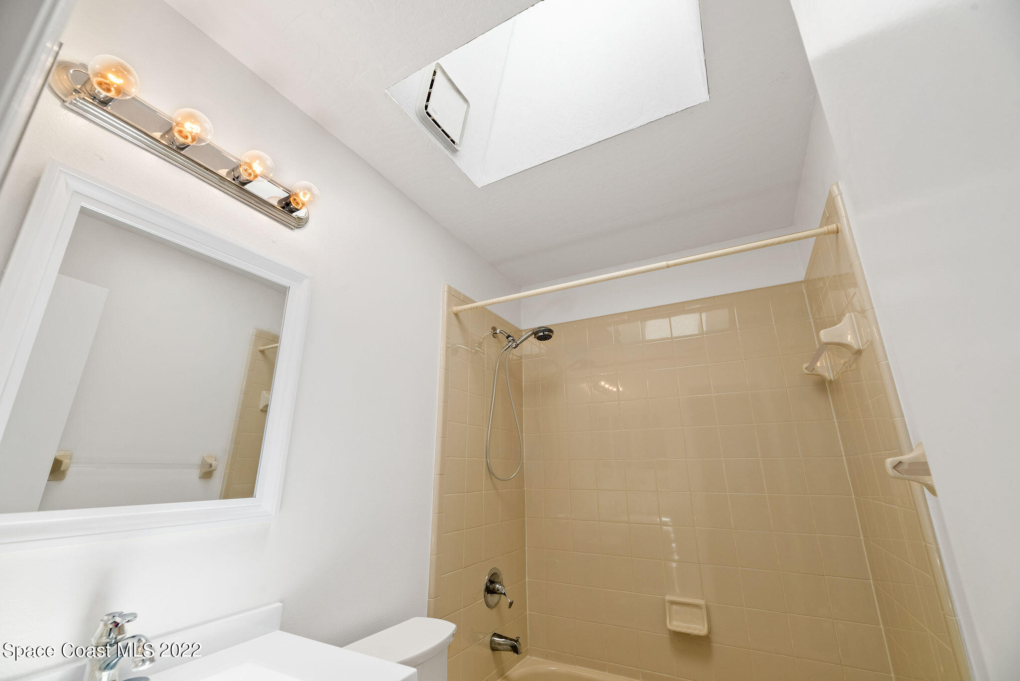 949 South Fork Circle Melbourne, FL 32901 - Photo 18 of 35 a bathroom with a shower and a sink