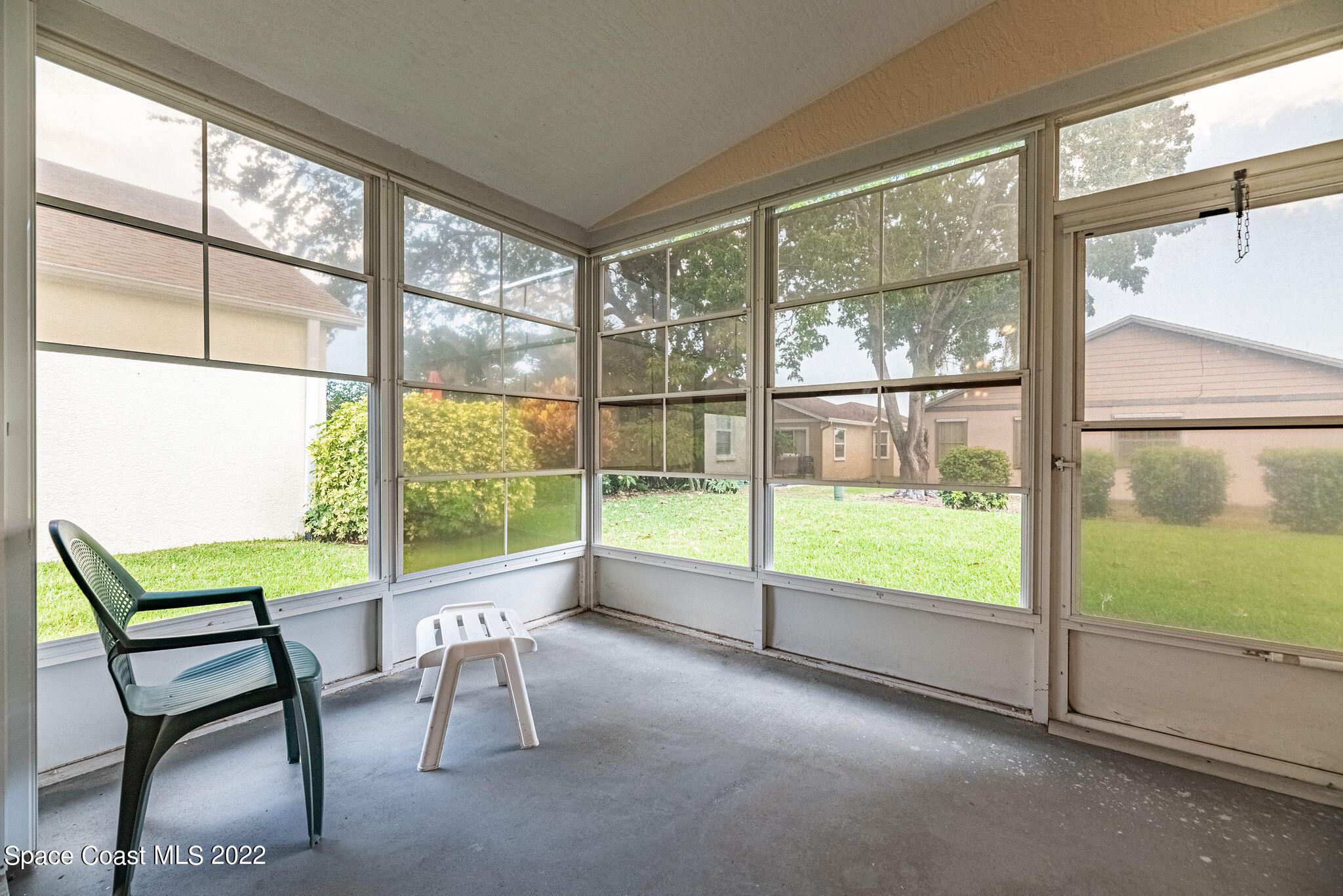 949 South Fork Circle Melbourne, FL 32901 - Photo 19 of 35 a view of a room with wooden floor and a chair