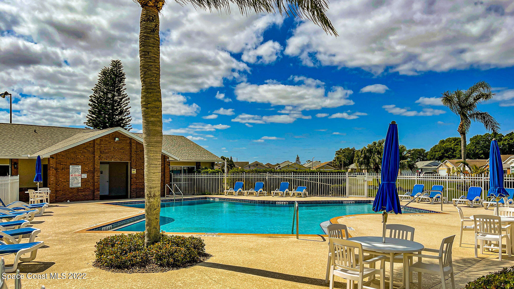 949 South Fork Circle Melbourne, FL 32901 - Photo 23 of 35 a view of a house with a swimming pool
