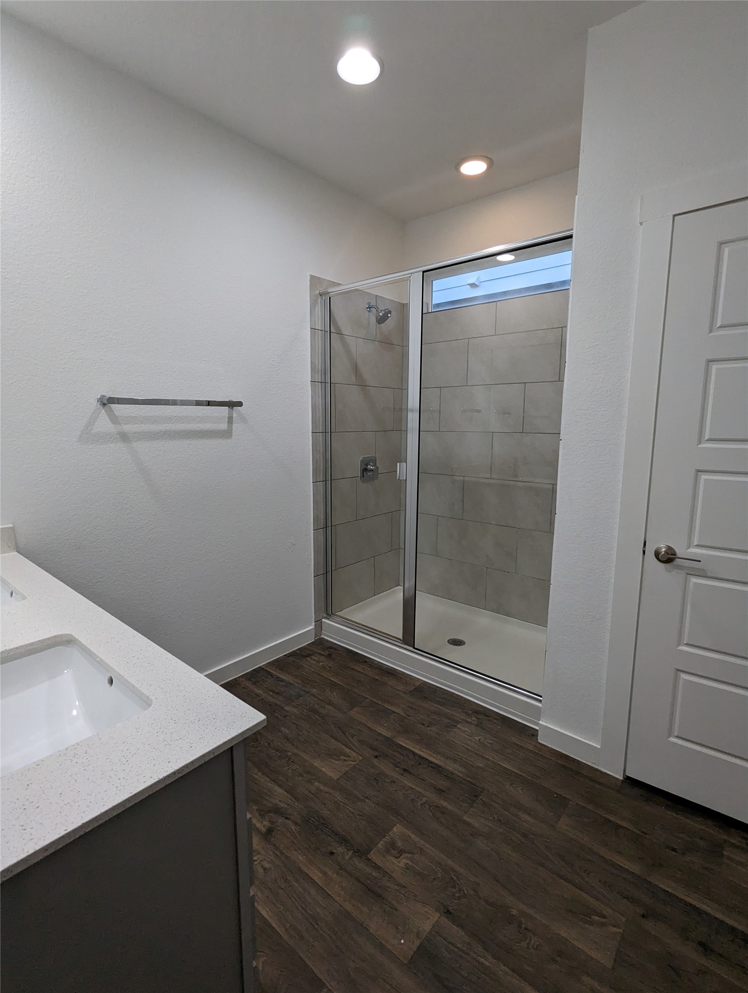 13804 Clerk Street Pflugerville, TX 78660 - Photo 7 of 14 a bathroom with a shower