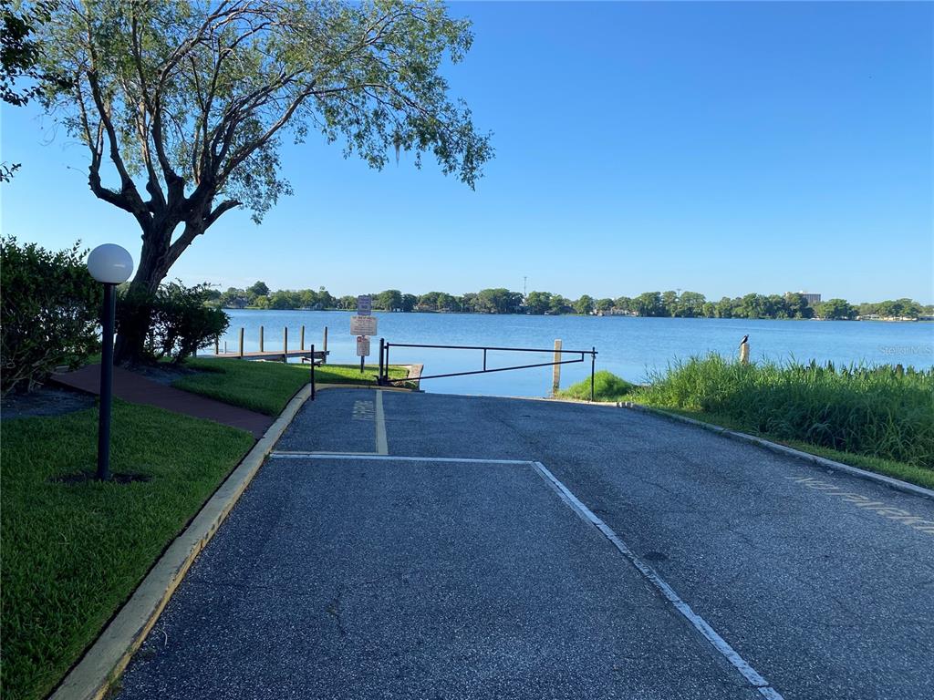 1500 Gay Road, Unit 17D Winter Park, FL 32789 - Photo 32 of 34 a view of lake with a big yard