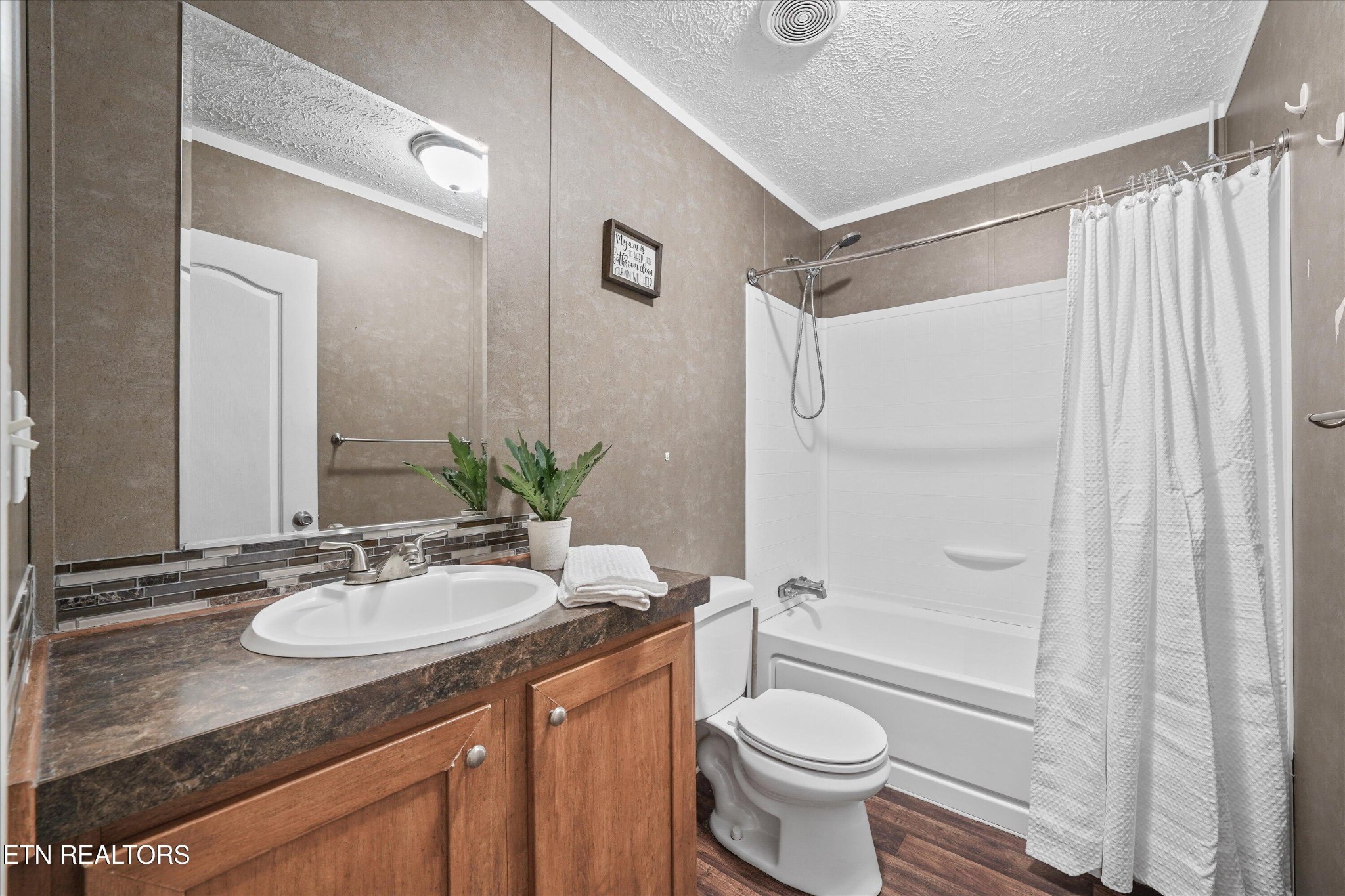 603 Bays Mountain Road Knoxville, TN 37920 - Photo 18 of 30 a bathroom with a granite countertop sink toilet and shower