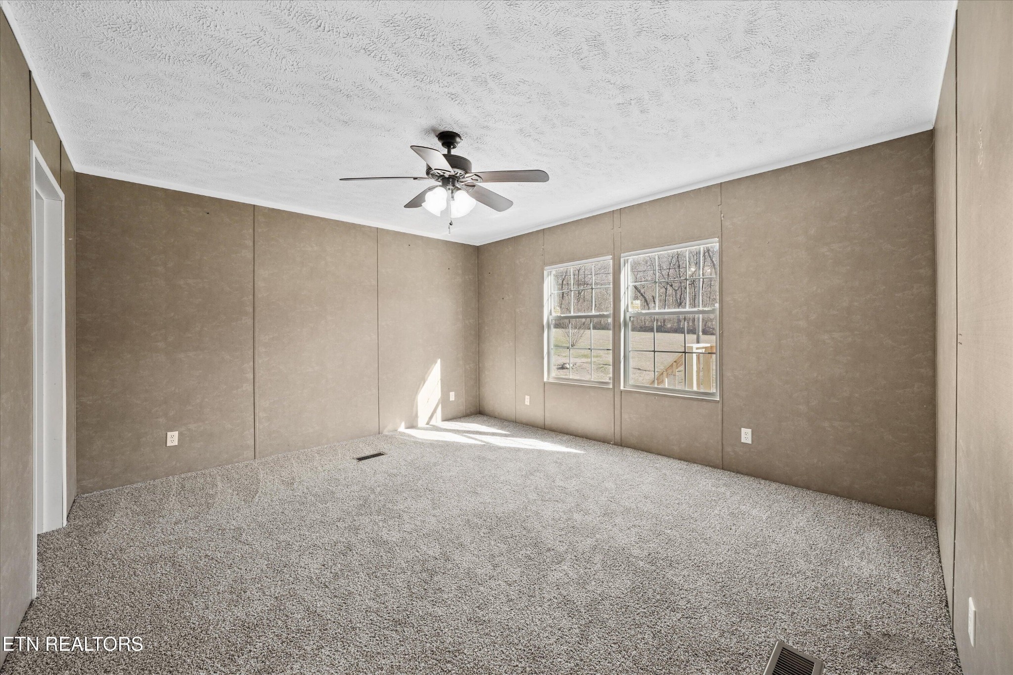 603 Bays Mountain Road Knoxville, TN 37920 - Photo 20 of 30 a view of an empty room with a window