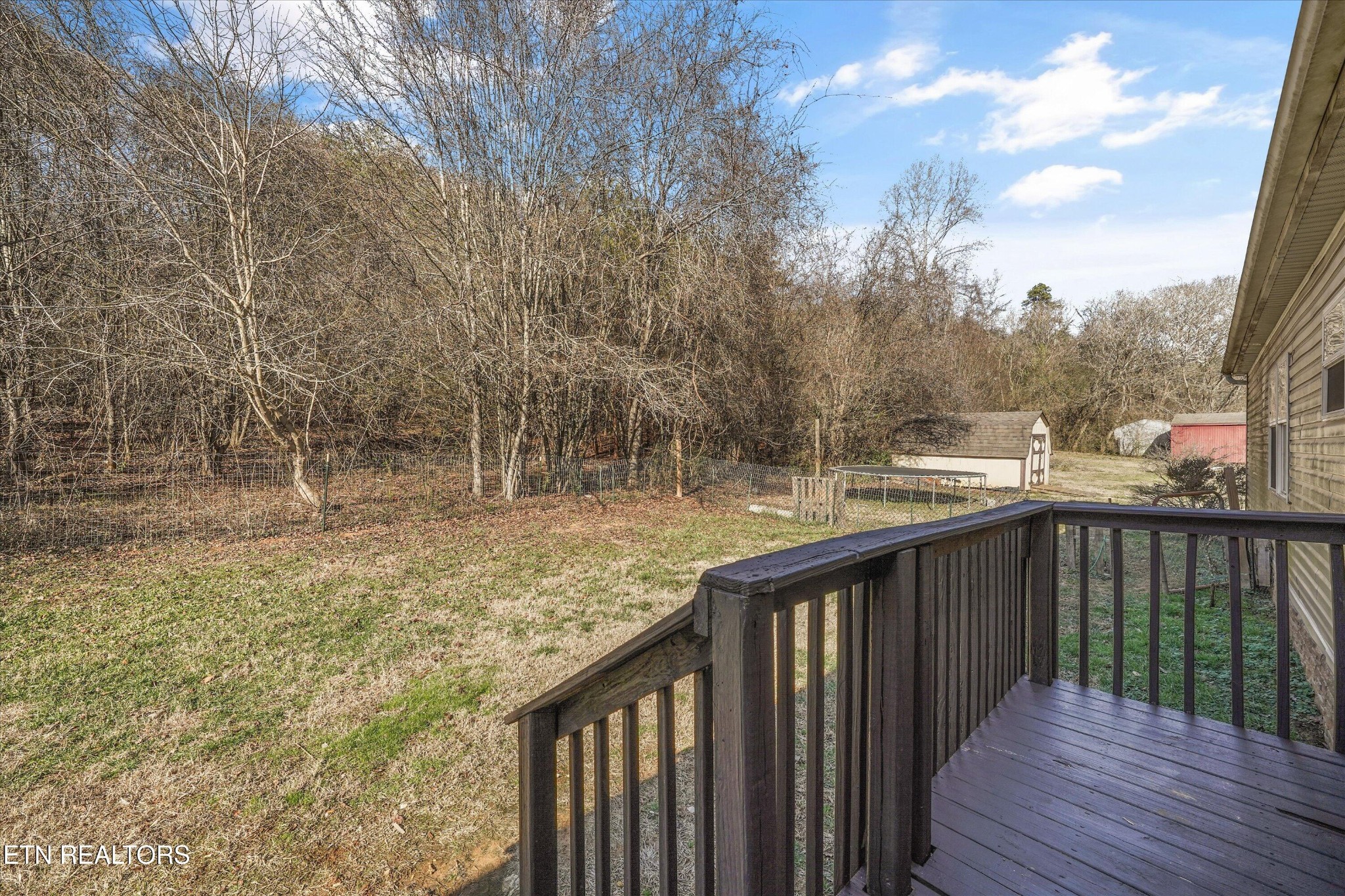603 Bays Mountain Road Knoxville, TN 37920 - Photo 25 of 30 a balcony with wooden floor and yard in the back