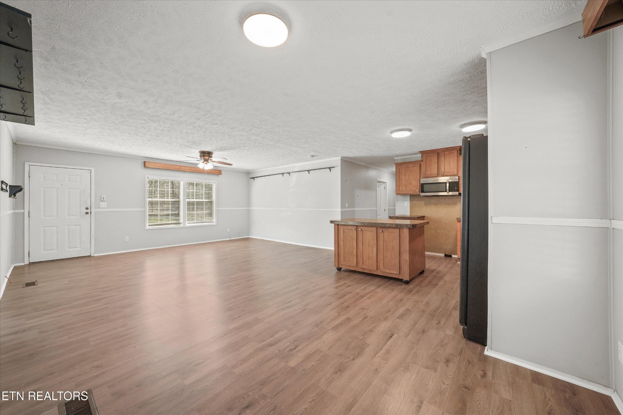 603 Bays Mountain Road Knoxville, TN 37920 - Photo 4 of 30 a room with wooden floor and windows
