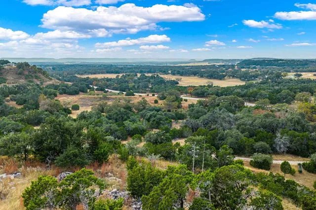 a view of a lake with a city