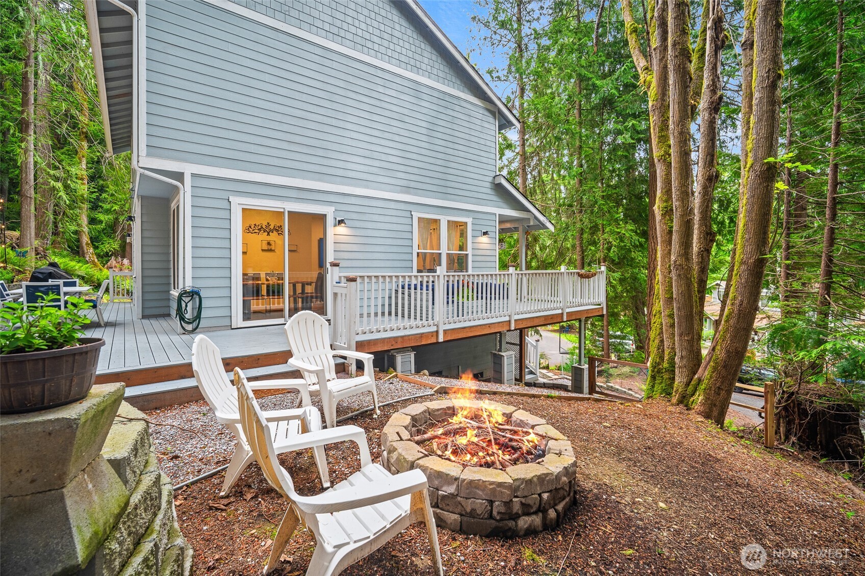 23 Spring Court Bellingham, WA 98229 - Photo 32 of 38 a view of backyard of house with outdoor seating