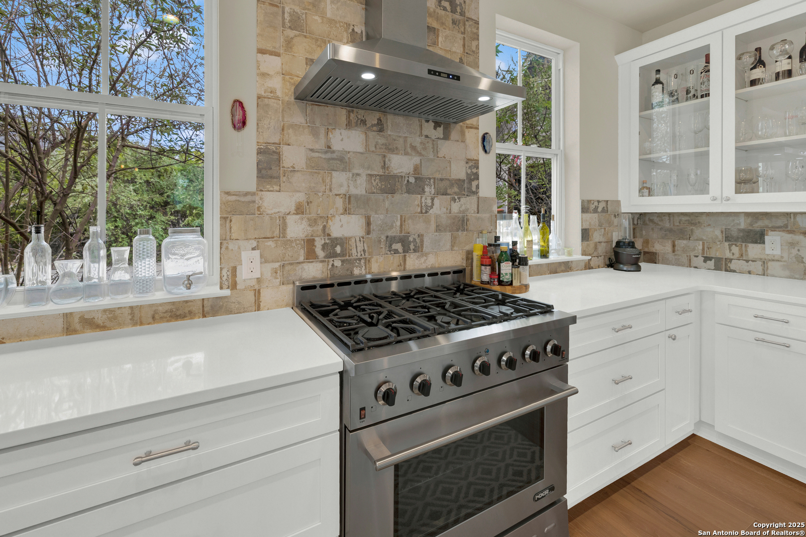 232 Freedom Street Fischer, TX 78623 - Photo 11 of 38 a white stove top oven sitting inside of a kitchen