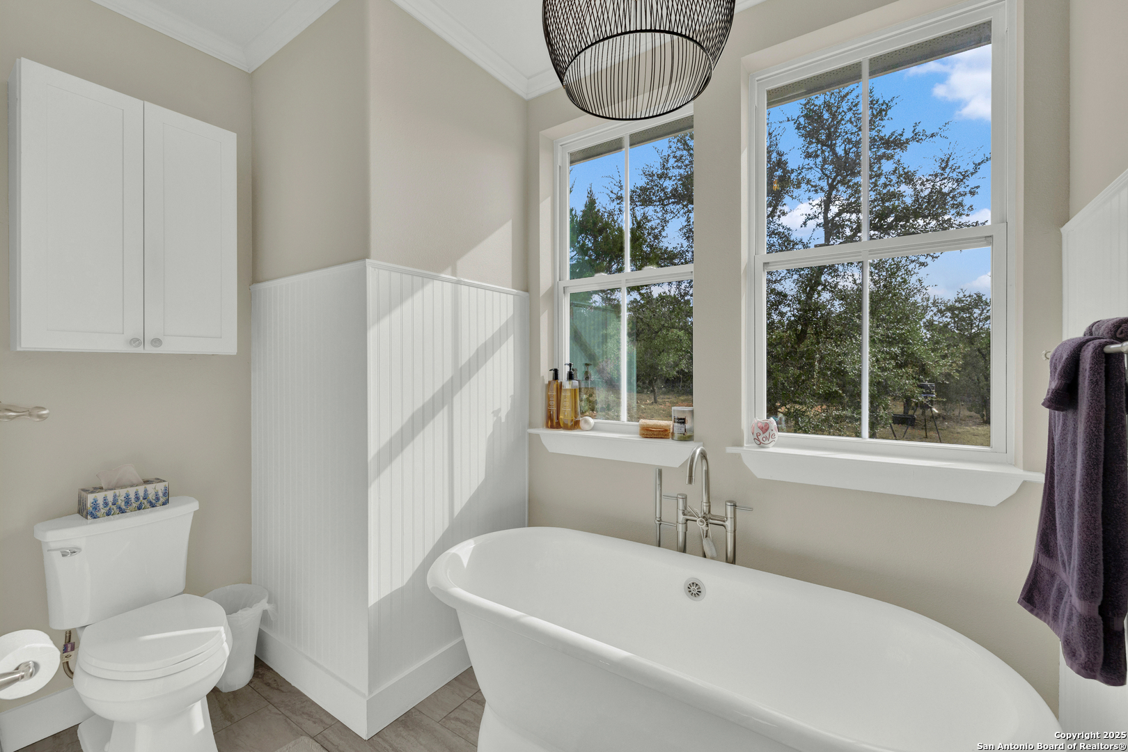 232 Freedom Street Fischer, TX 78623 - Photo 18 of 38 a white bath tub sitting next to a toilet
