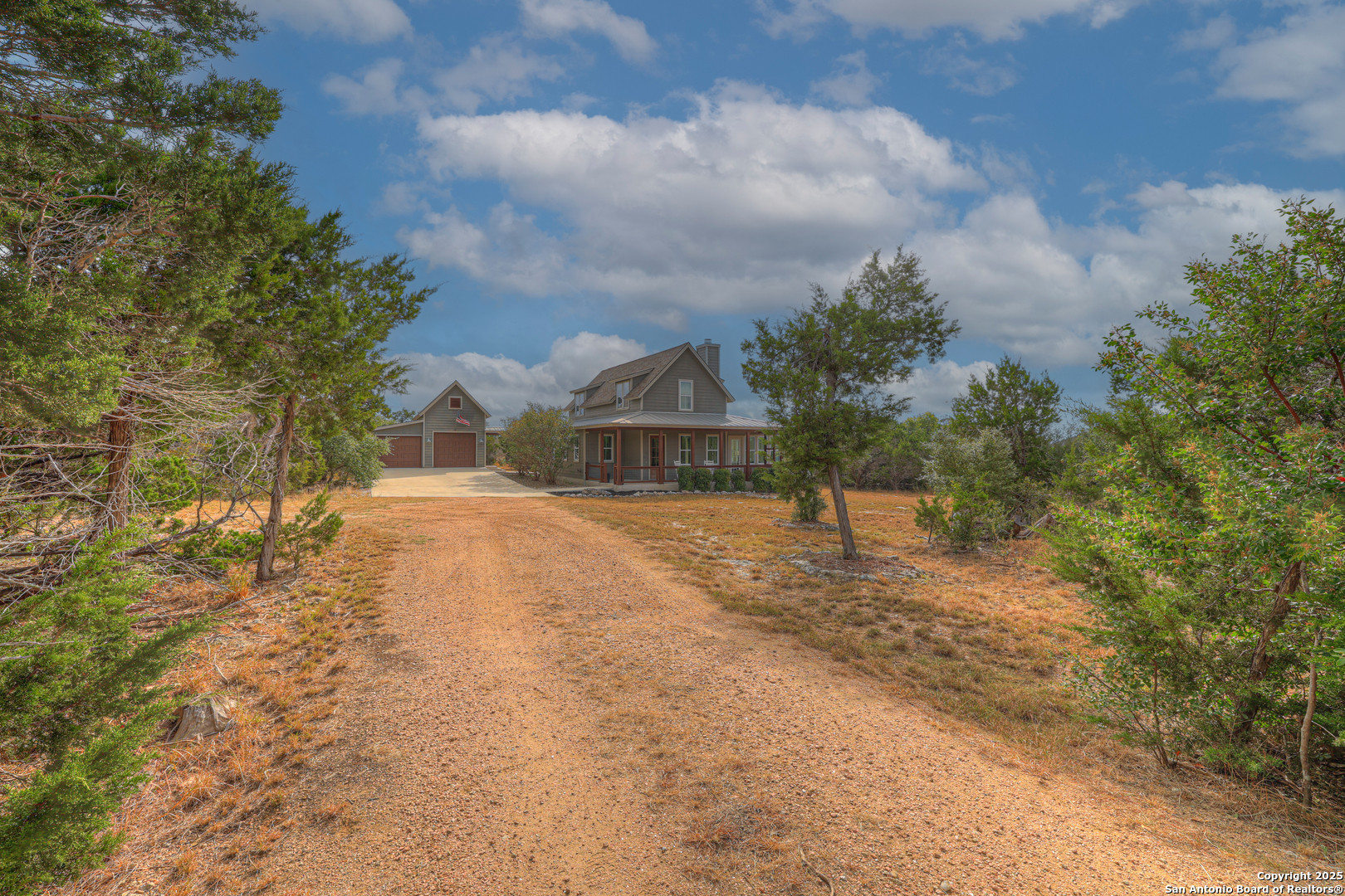 232 Freedom Street Fischer, TX 78623 - Photo 2 of 38 a view of ocean with large trees