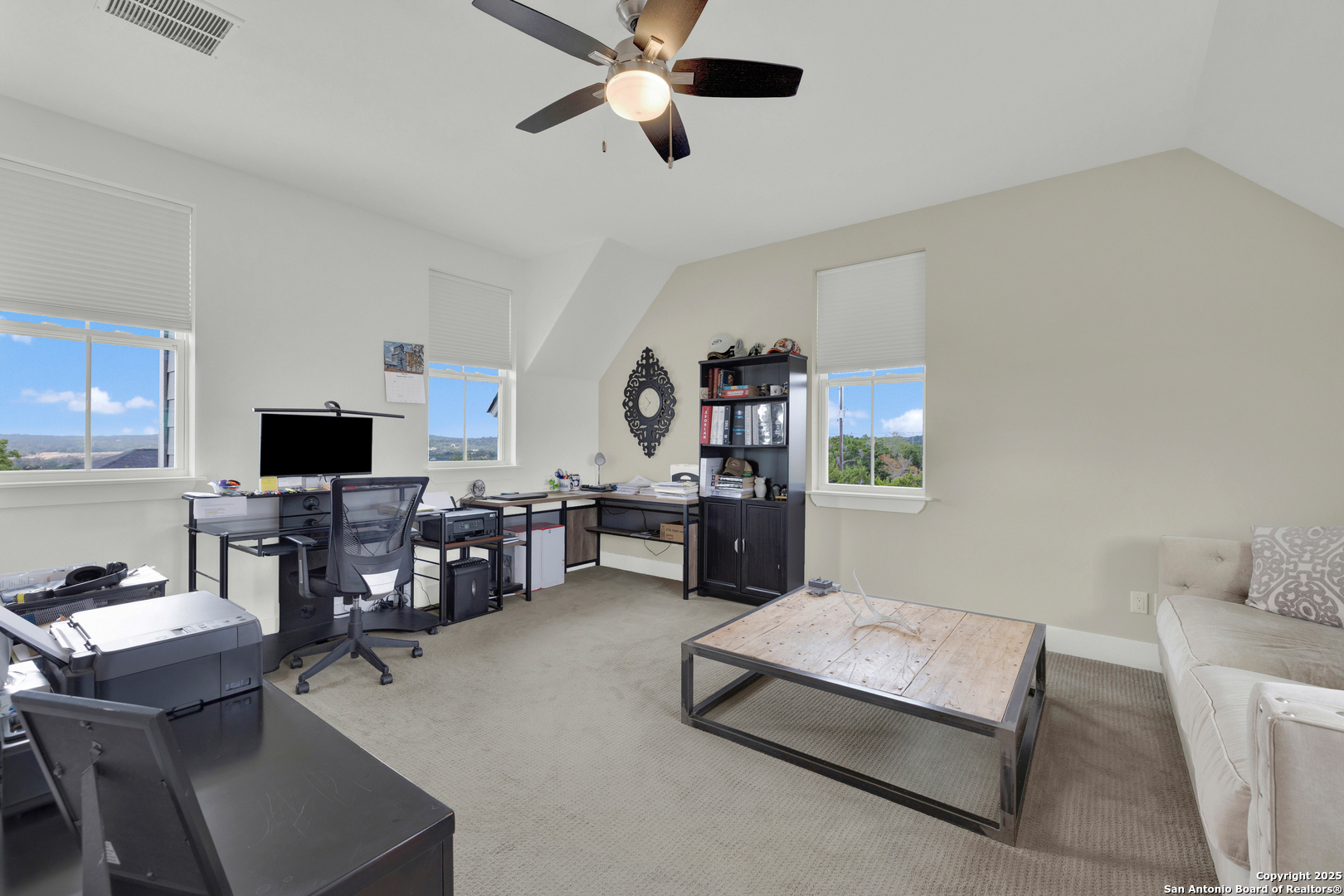 232 Freedom Street Fischer, TX 78623 - Photo 24 of 38 a living room with furniture and a flat screen tv
