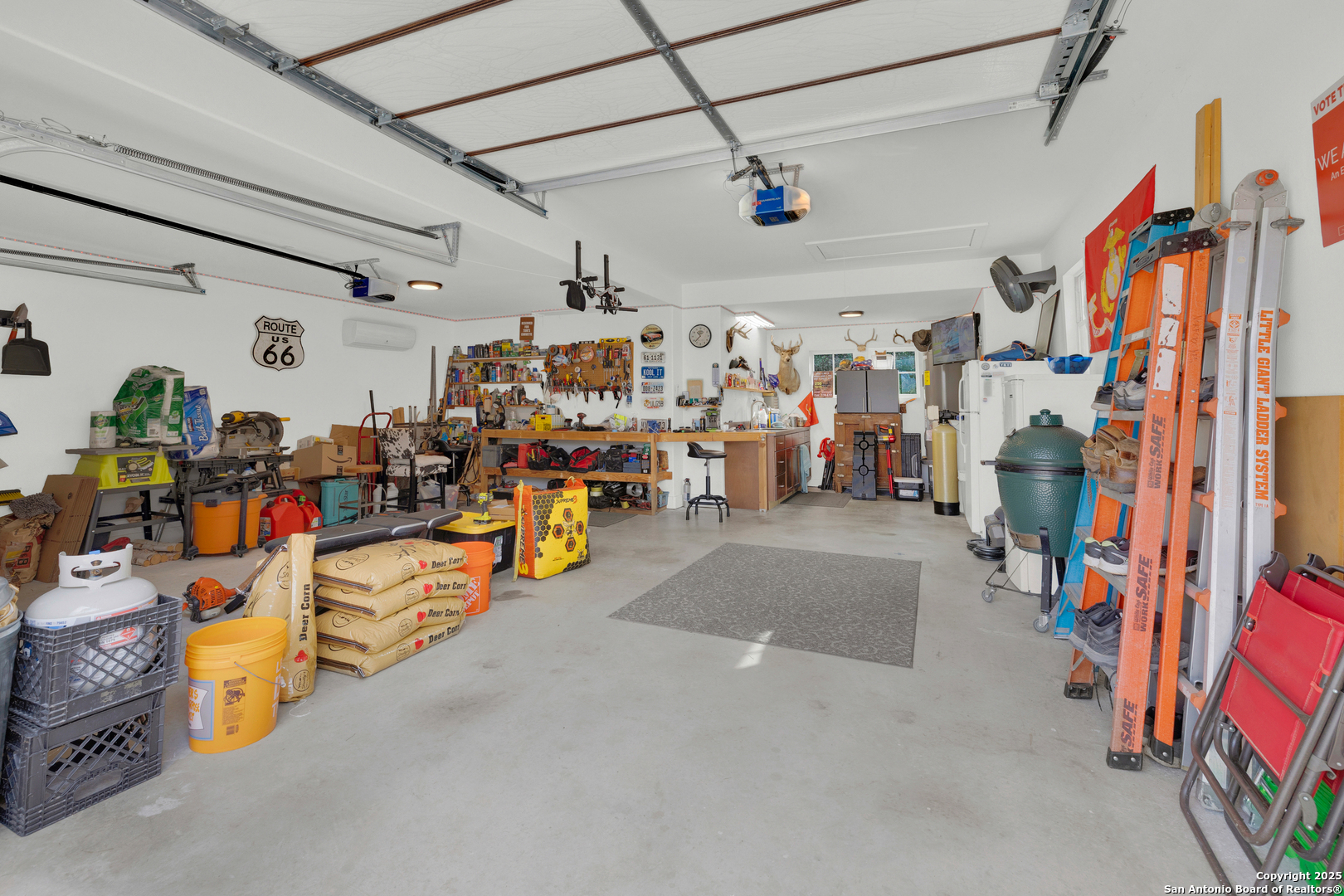 232 Freedom Street Fischer, TX 78623 - Photo 27 of 38 a view of a garage with storage