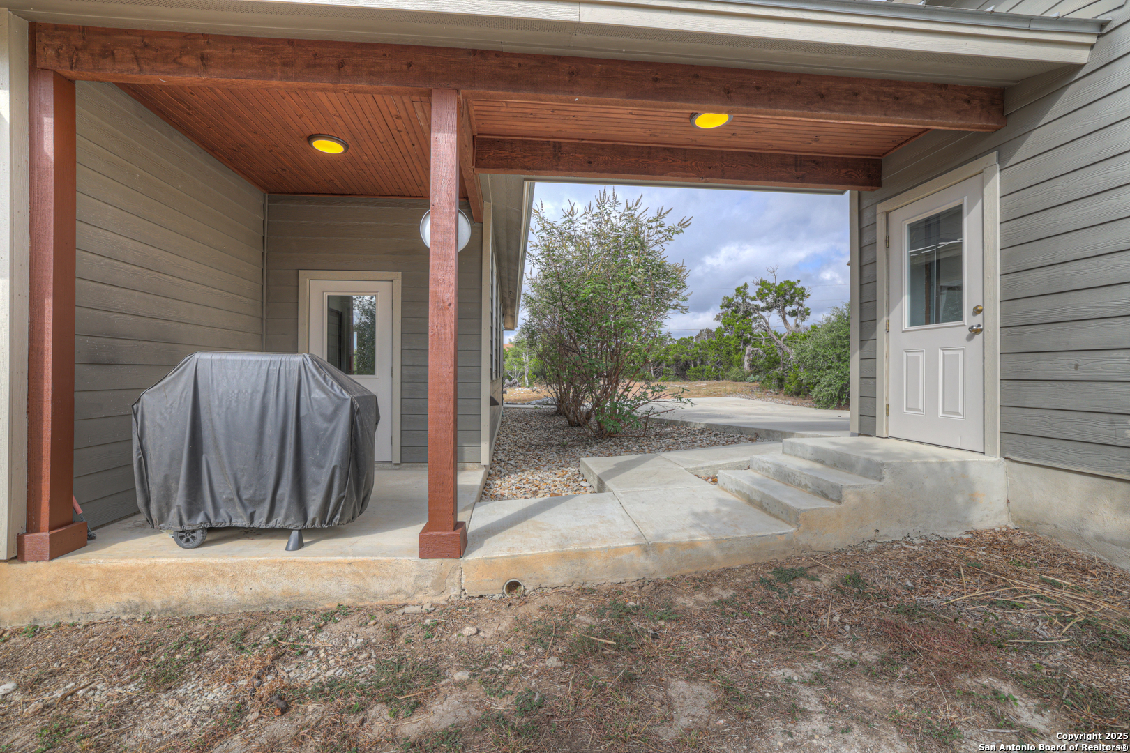232 Freedom Street Fischer, TX 78623 - Photo 28 of 38 a view of a porch with seating space