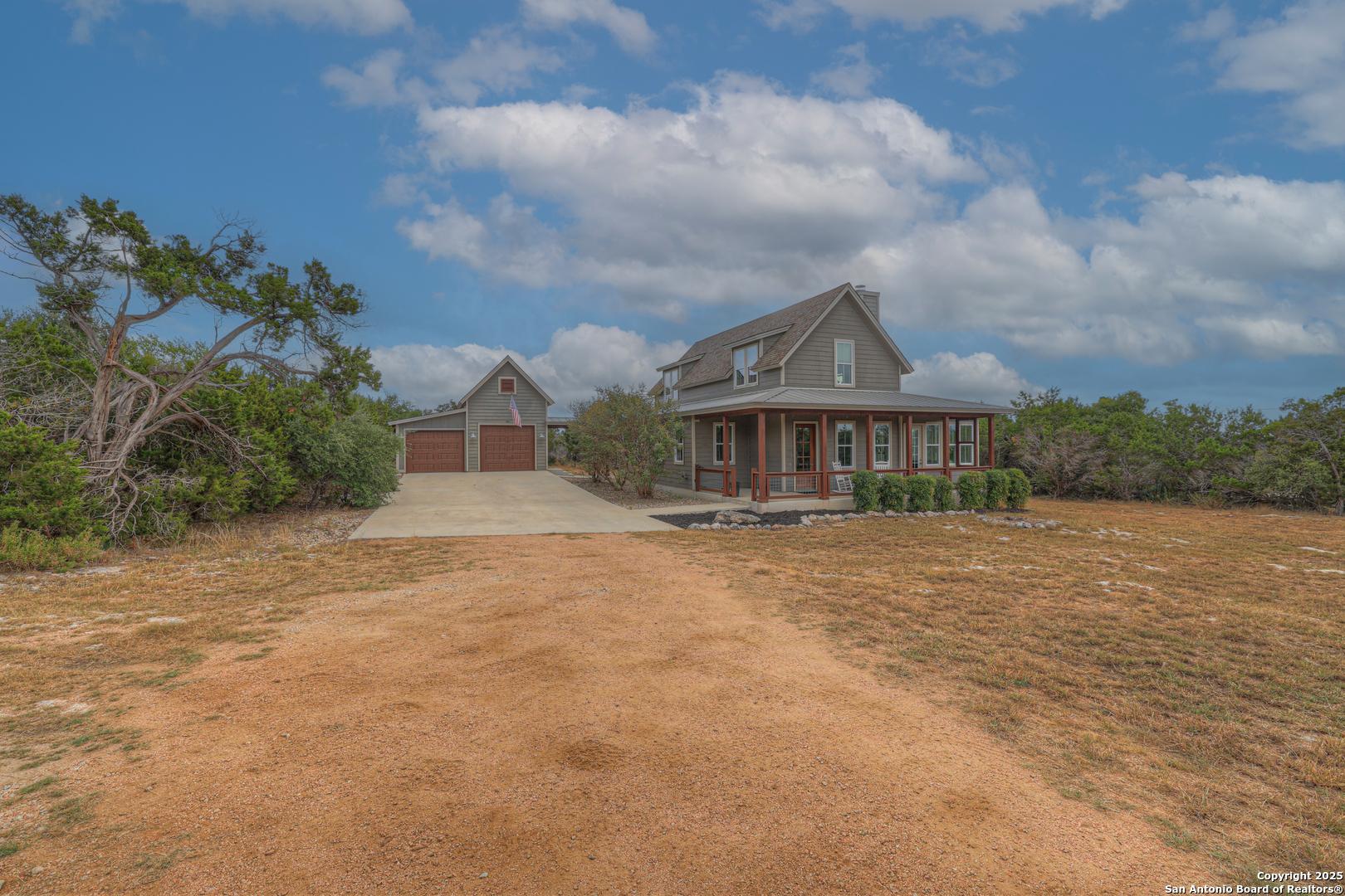 232 Freedom Street Fischer, TX 78623 - Photo 3 of 38 a front view of a house with a yard