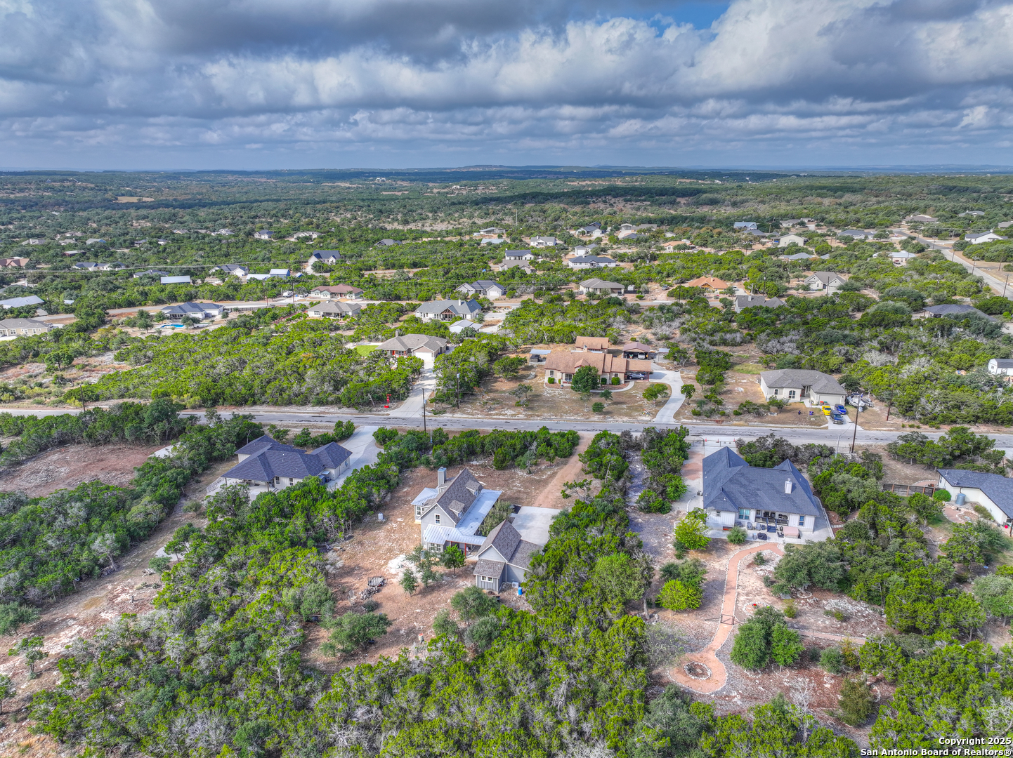 232 Freedom Street Fischer, TX 78623 - Photo 33 of 38 an aerial view of residential building and green space