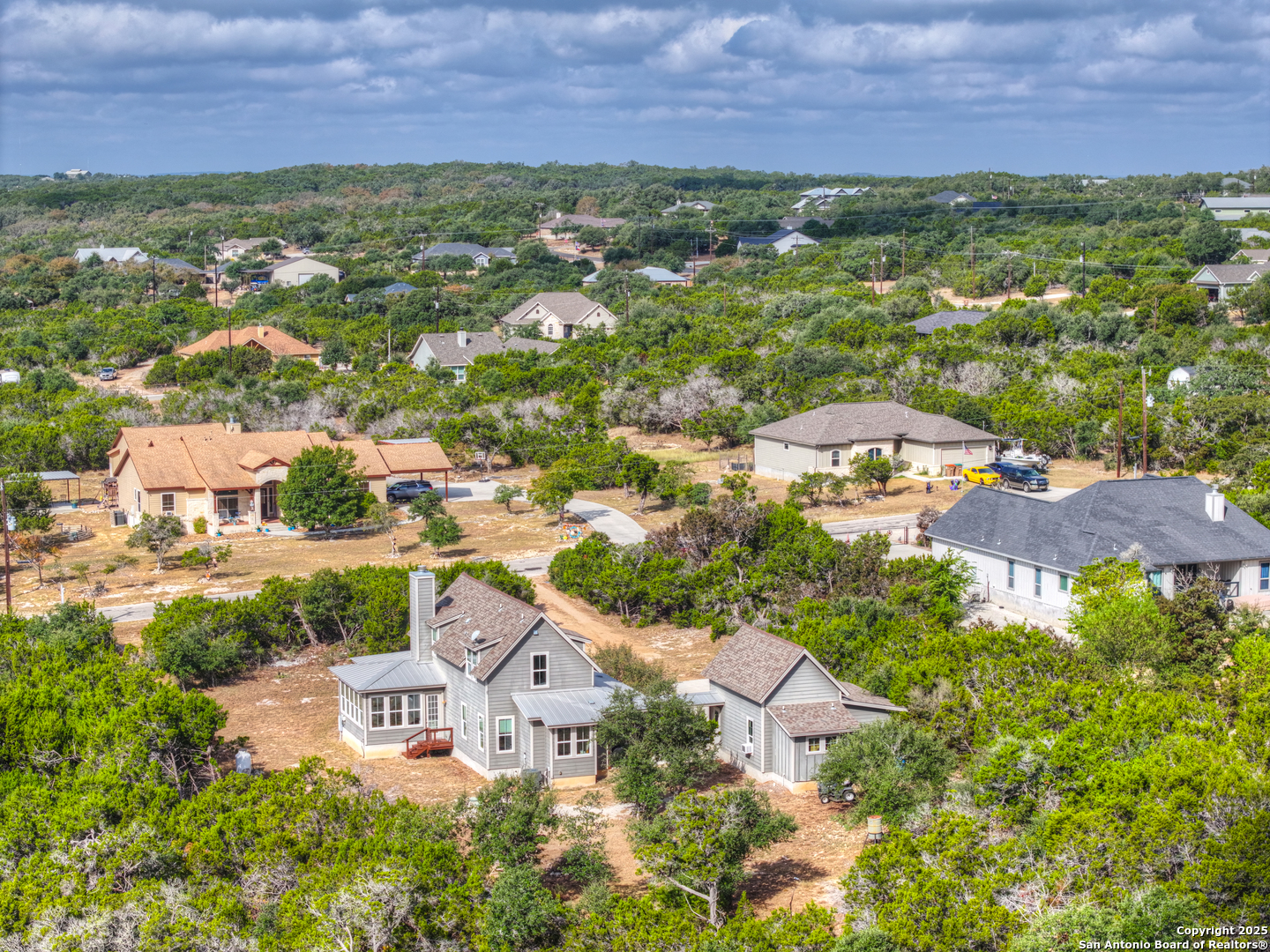 232 Freedom Street Fischer, TX 78623 - Photo 37 of 38 an aerial view of residential house with outdoor space and garden