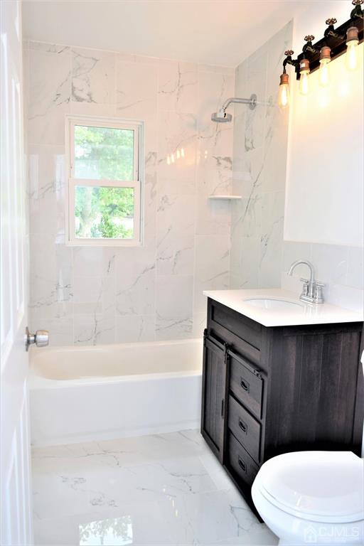 19 Sine Road Edison, NJ 08817 - Photo 12 of 21 a bathroom with a sink a toilet and bathtub
