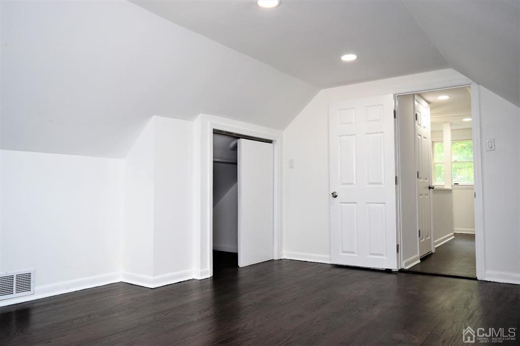 19 Sine Road Edison, NJ 08817 - Photo 14 of 21 a view of an empty room with wooden floor