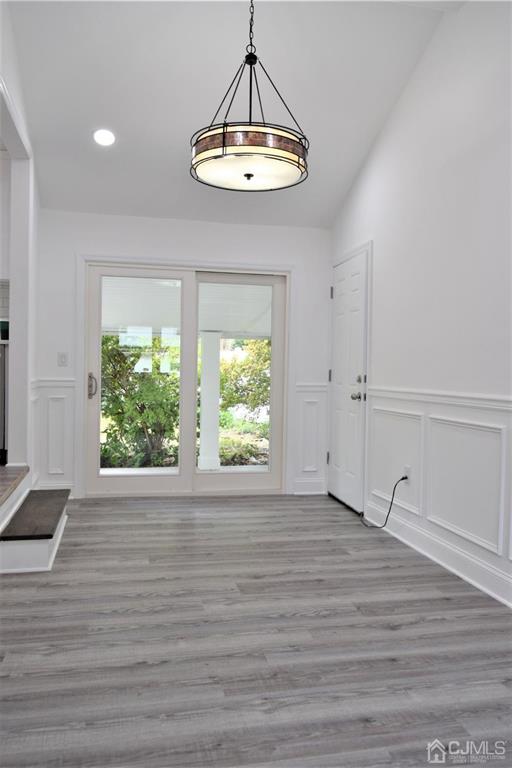 19 Sine Road Edison, NJ 08817 - Photo 9 of 21 a view of empty room with wooden floor and window