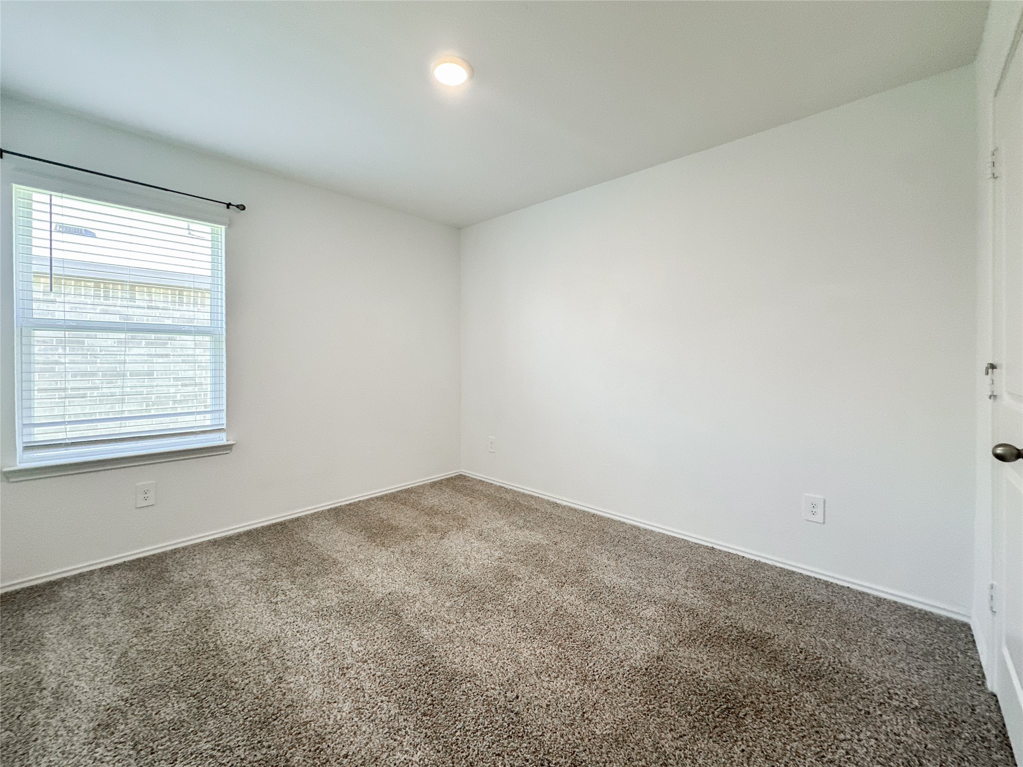 5715 Vintage Oakmont Drive Spring, TX 77373 - Photo 17 of 39 an empty room with a window