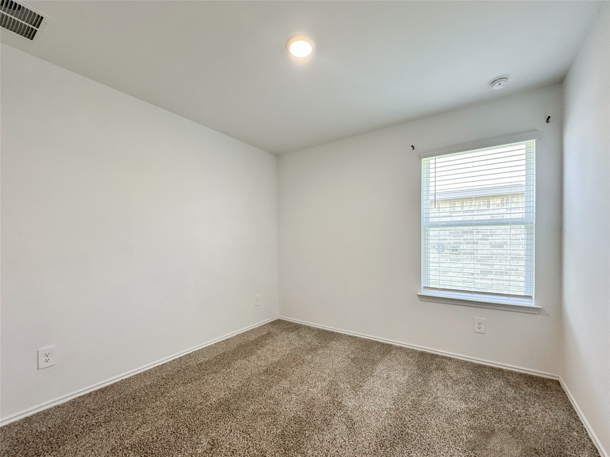5715 Vintage Oakmont Drive Spring, TX 77373 - Photo 19 of 39 an empty room with a window