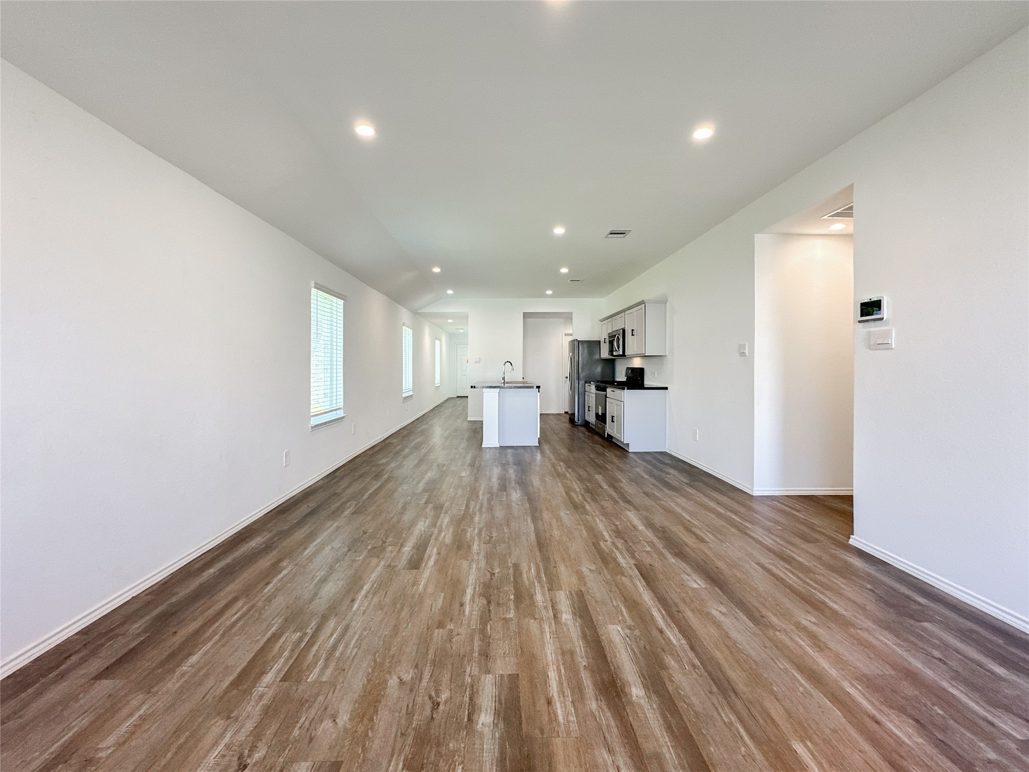5715 Vintage Oakmont Drive Spring, TX 77373 - Photo 27 of 39 a view of empty room with wooden floor