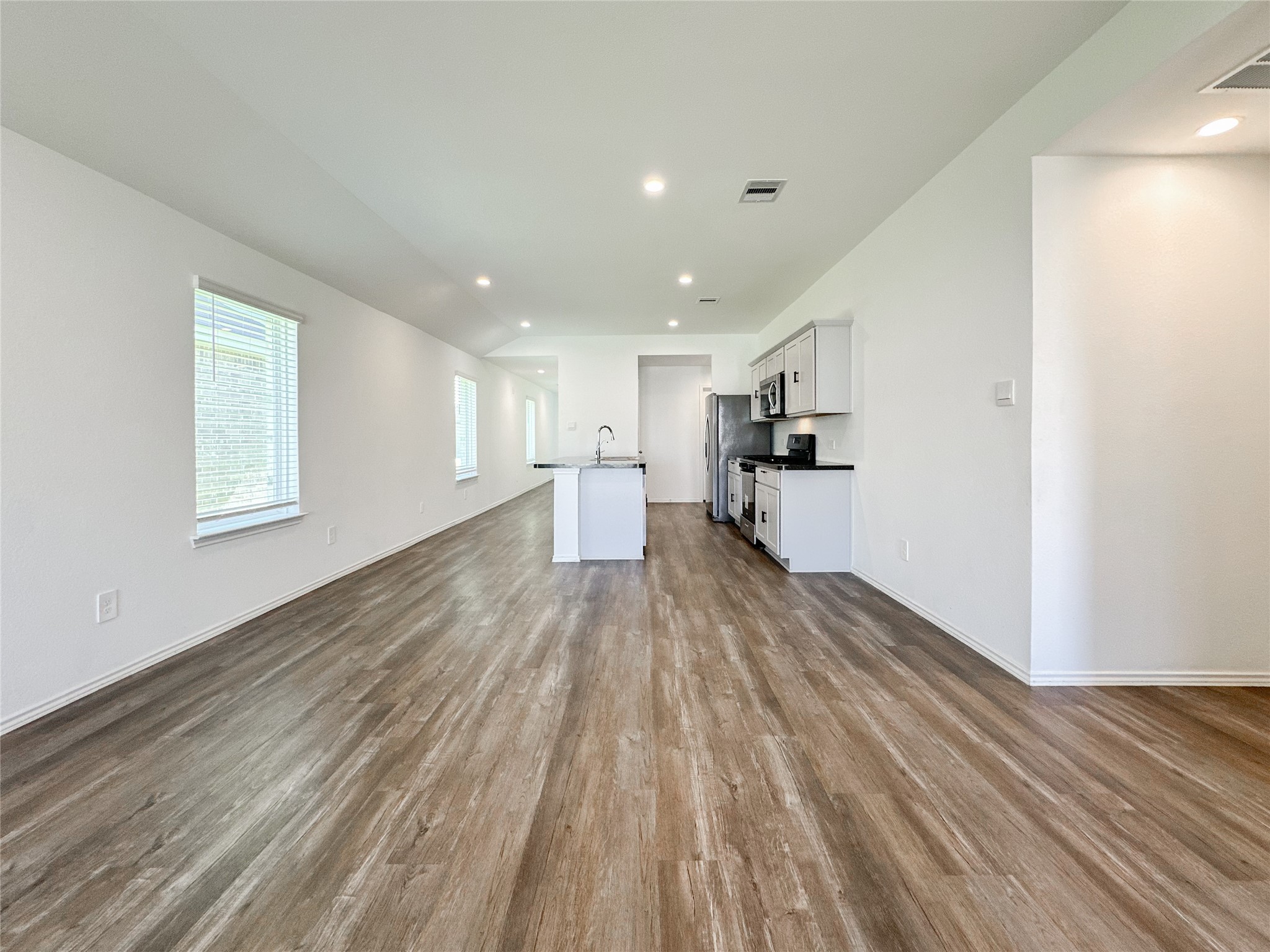 5715 Vintage Oakmont Drive Spring, TX 77373 - Photo 29 of 39 a view of empty room with wooden floor