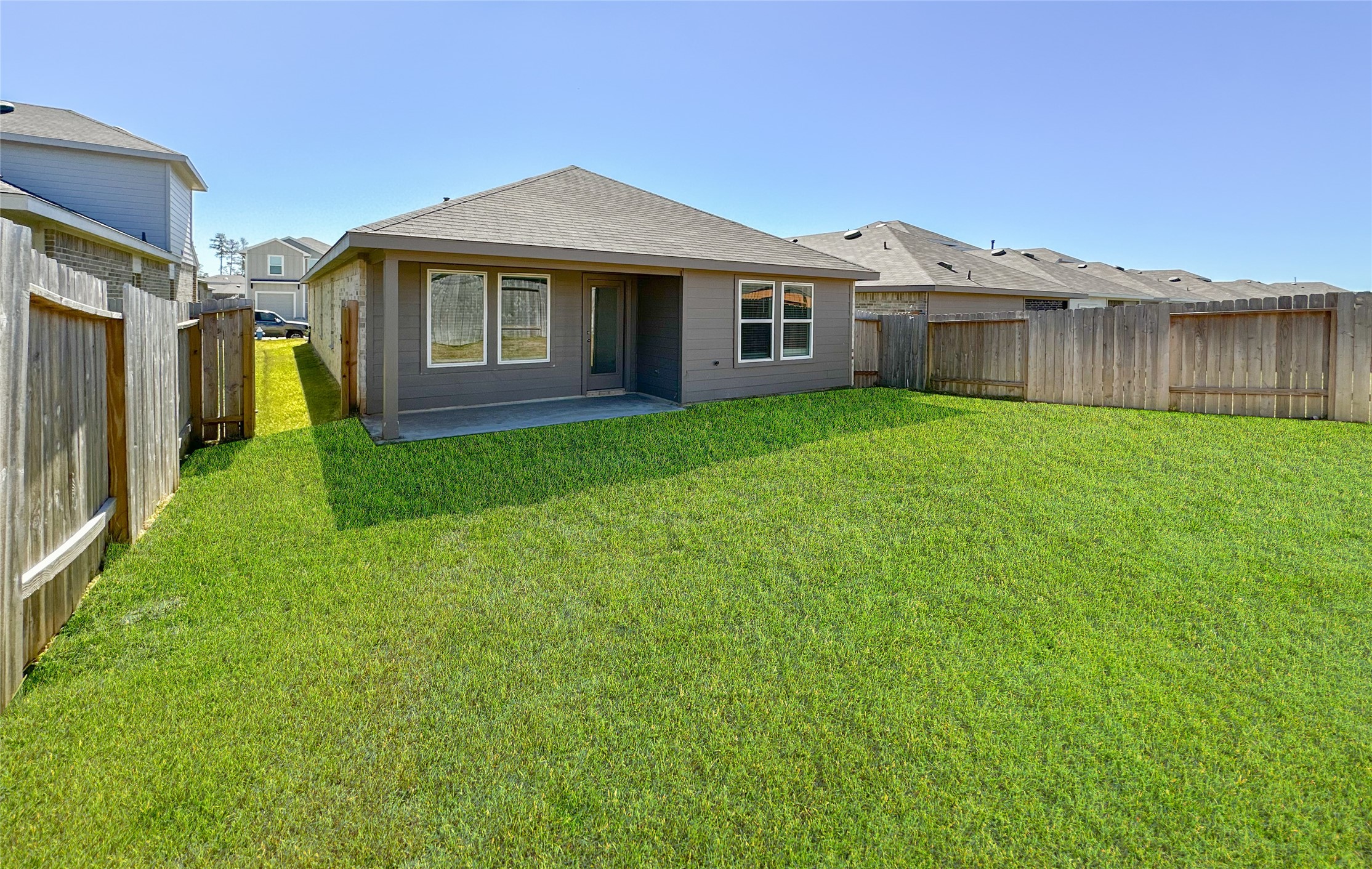 5715 Vintage Oakmont Drive Spring, TX 77373 - Photo 37 of 39 a view of a yard in front of a house with large trees