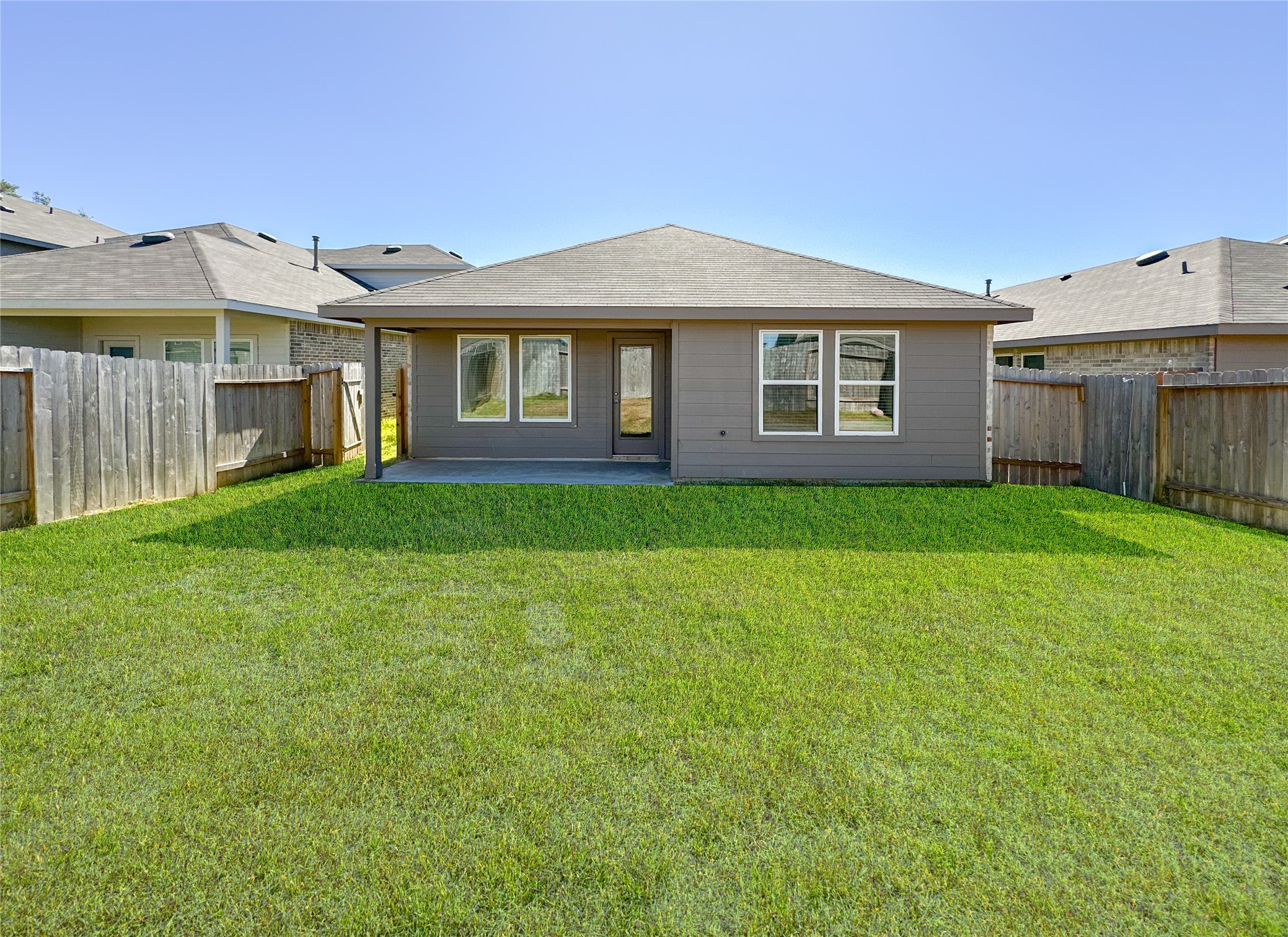5715 Vintage Oakmont Drive Spring, TX 77373 - Photo 38 of 39 a view of a yard in front of a house