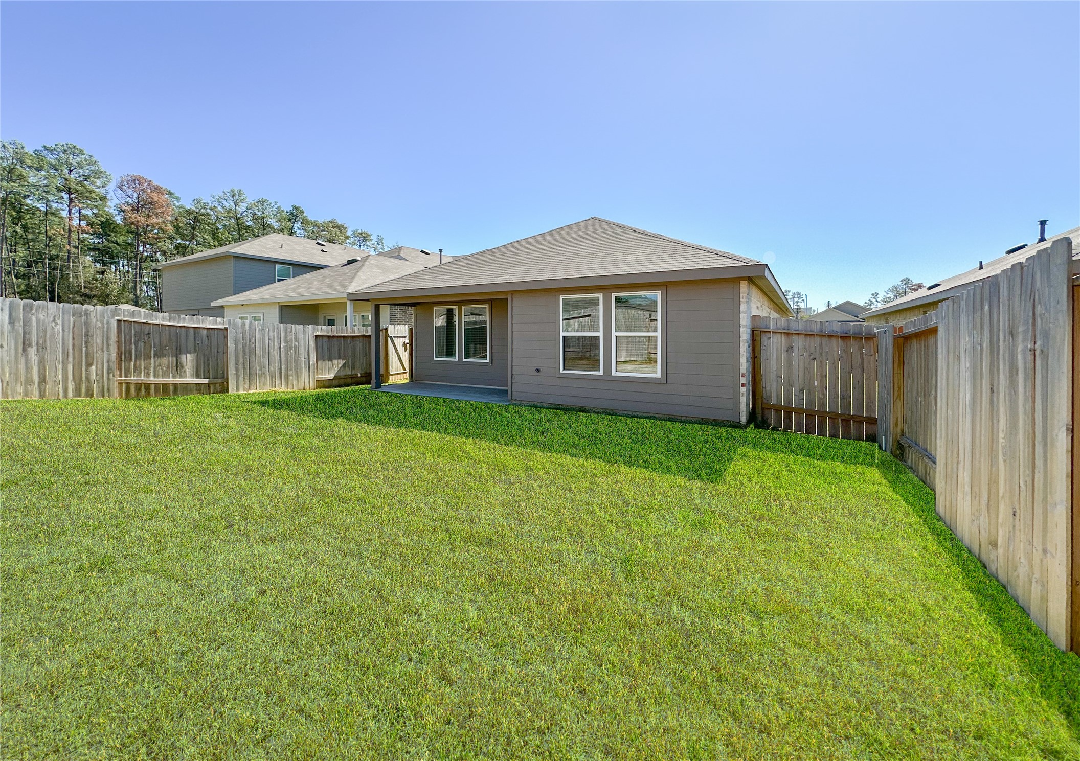 5715 Vintage Oakmont Drive Spring, TX 77373 - Photo 39 of 39 a view of a house with a yard and sitting area