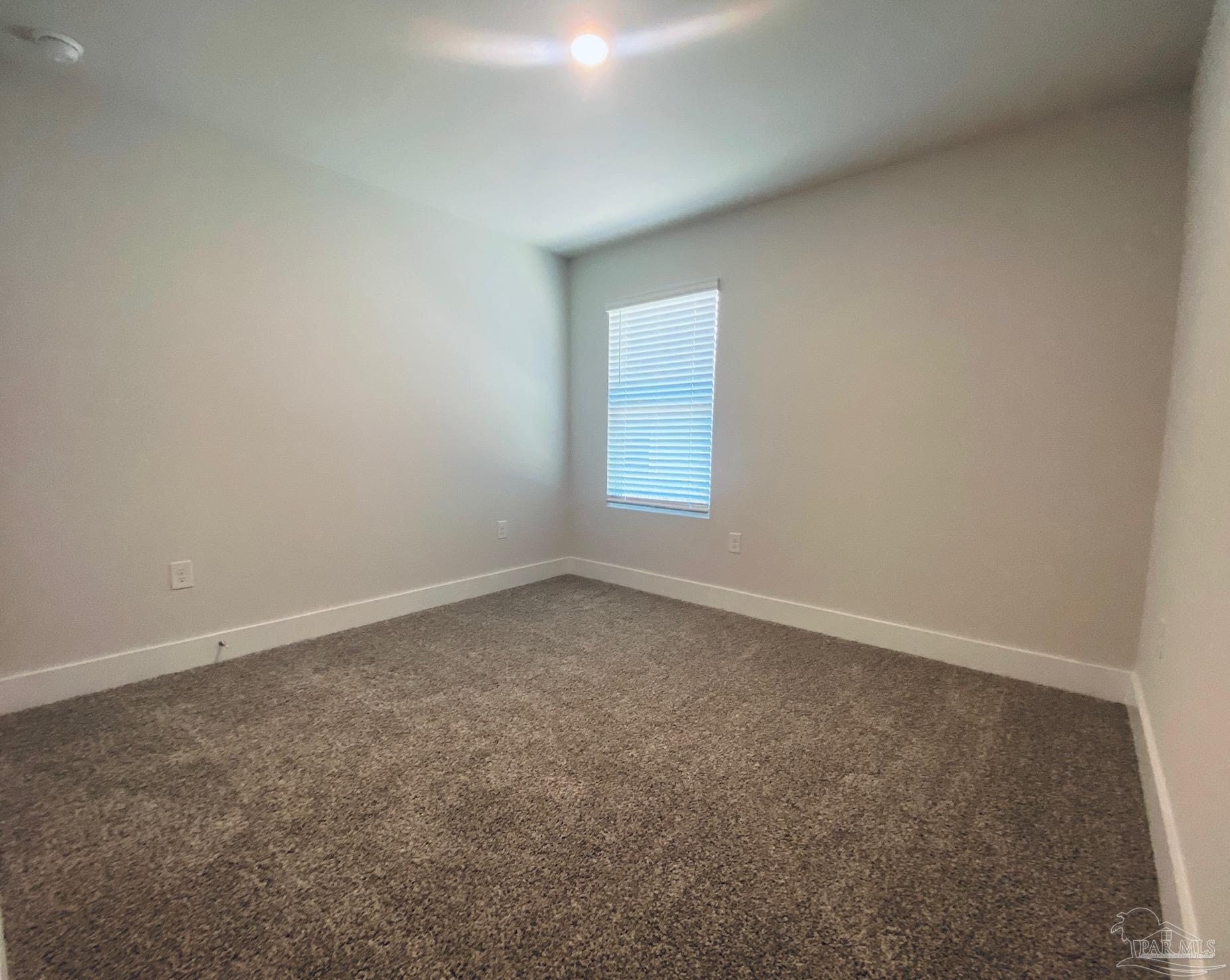 3021 Serviceberry Road Cantonment, FL 32533 - Photo 20 of 21 an empty room with a window