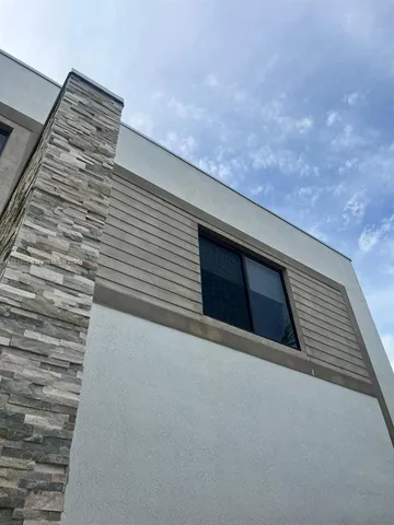 a bathroom with a sink and toilet