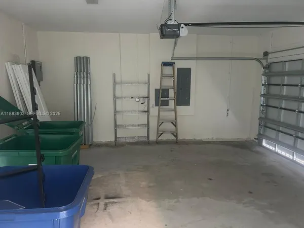 a view of a livingroom with a staircase