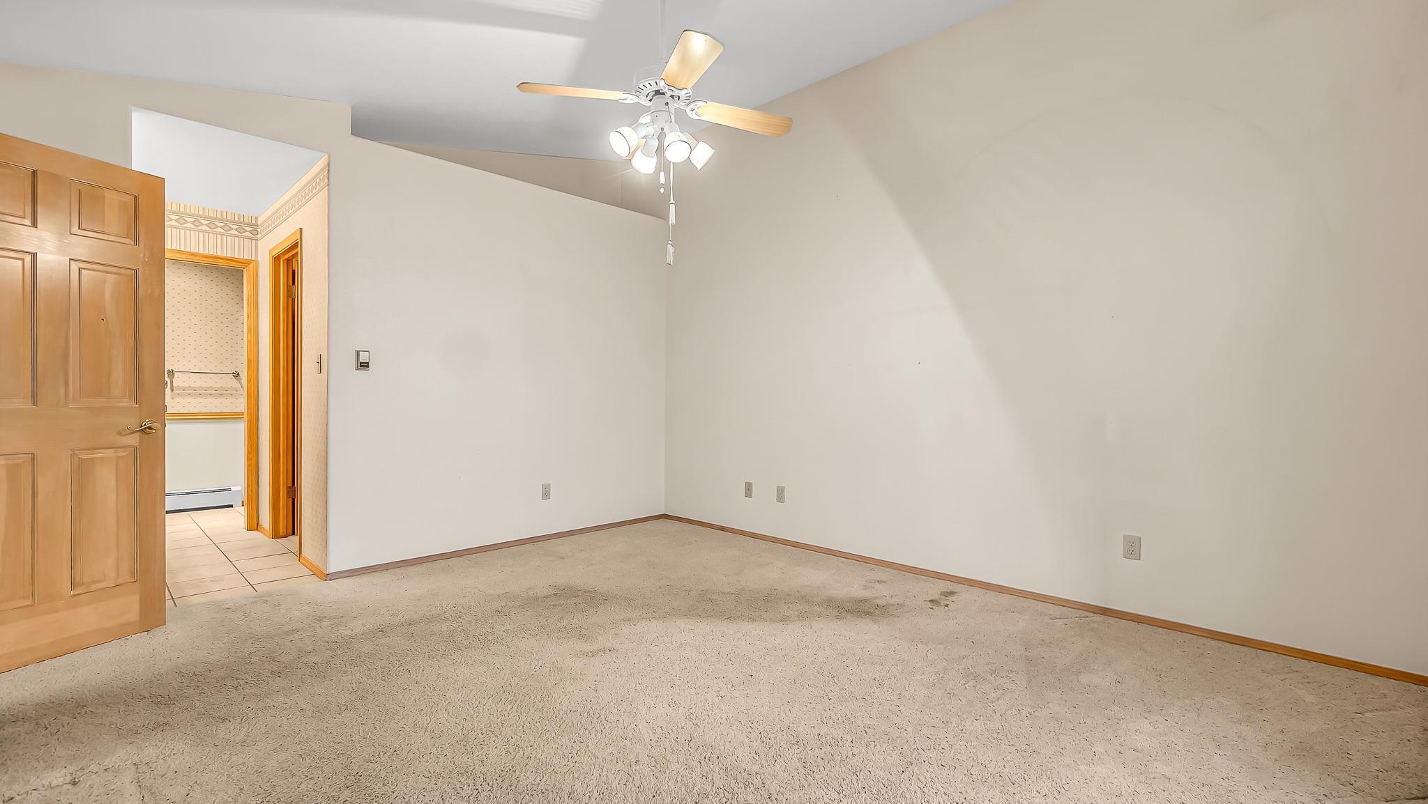 12 West Ridge Court Parachute, CO 81635 - Photo 11 of 37 a view of a room with a ceiling fan and a window