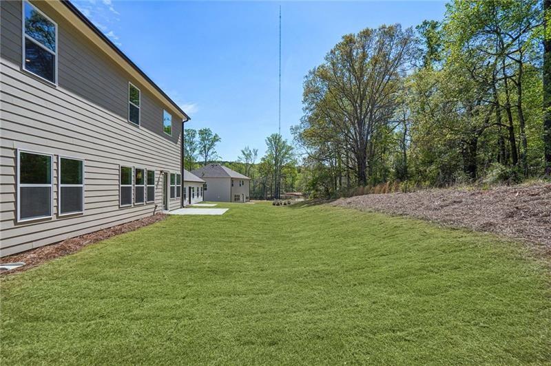 240 Silverleaf Trail Bethlehem, GA 30620 - Photo 26 of 35 a backyard of a house with lots of green space